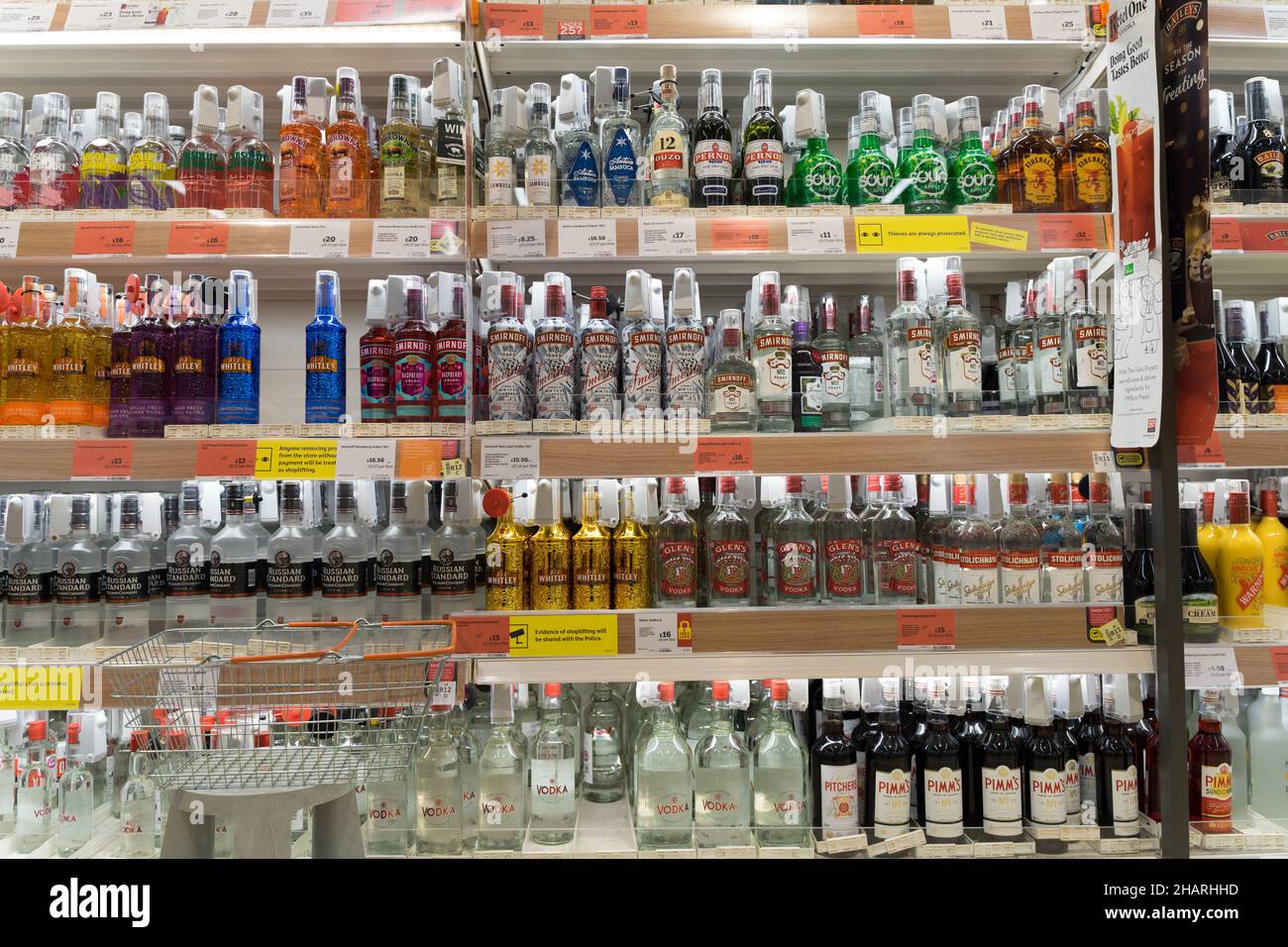 four rows of white wines display on shelves at Drinks aisle in a supermarket Kent UK Stock Photo