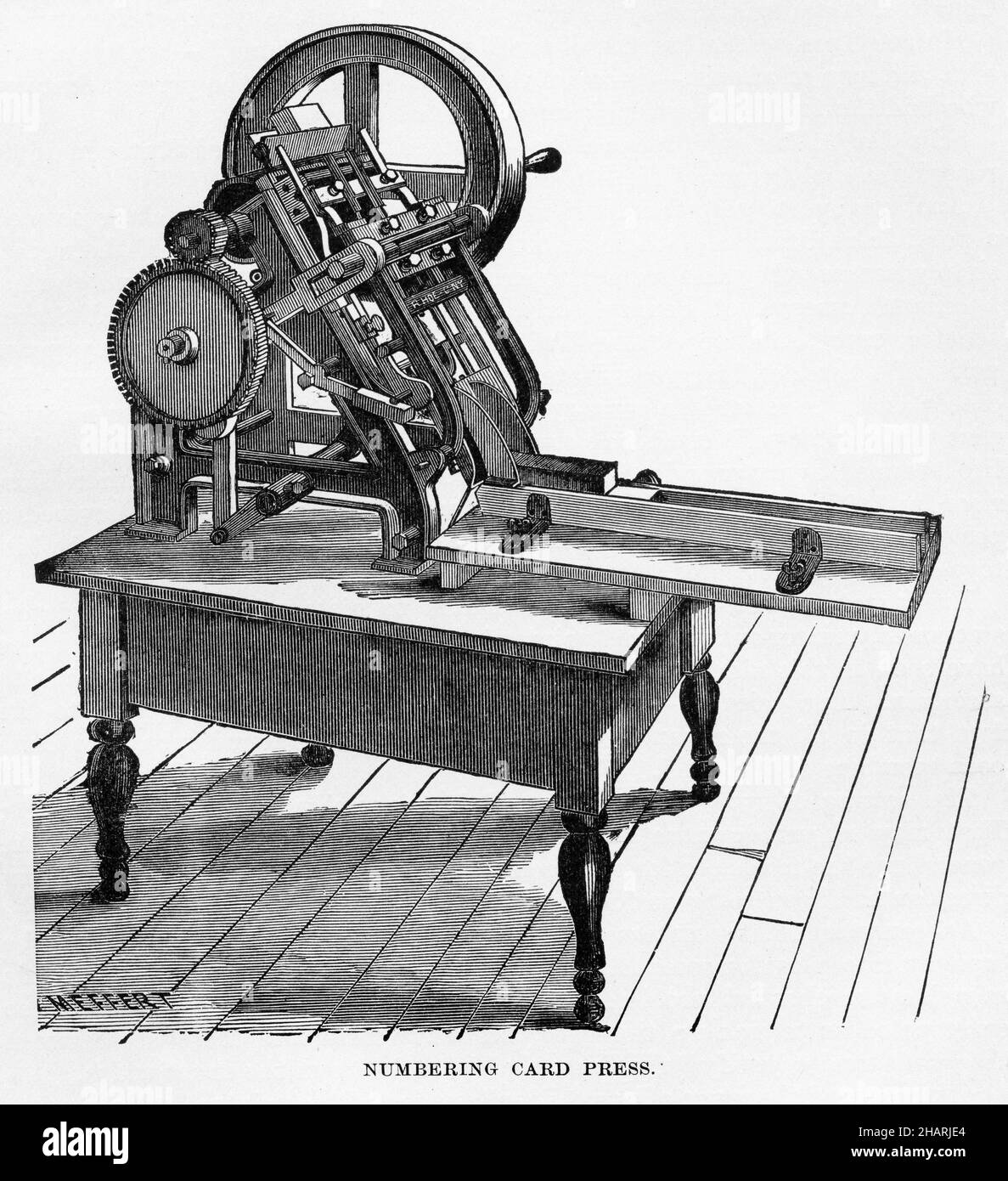 Engraving of a numbering card press Stock Photo