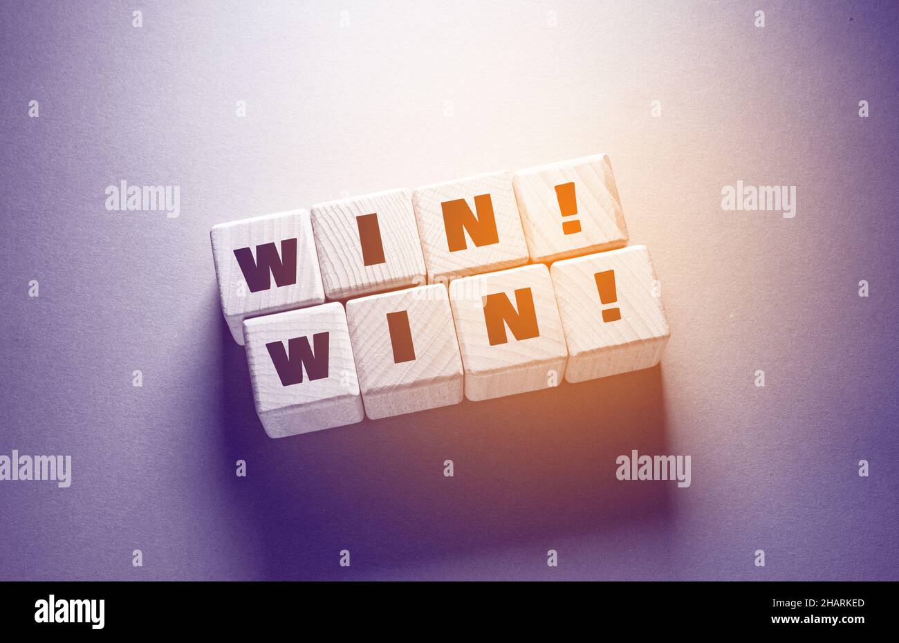 Win Word Written on Wooden Cubes Stock Photo