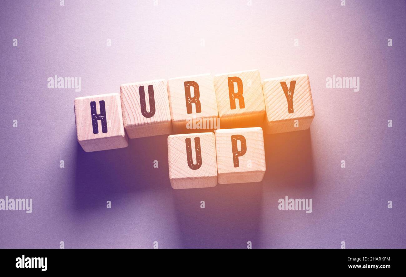 Hurry up Word Written on Wooden Cubes Stock Photo