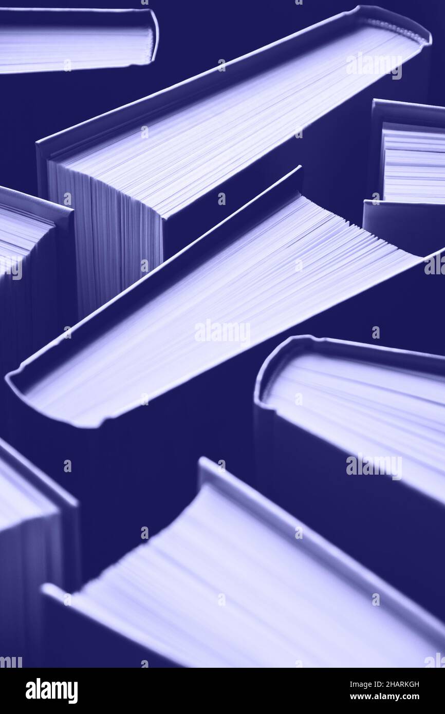 Books background purple toned toned Stock Photo