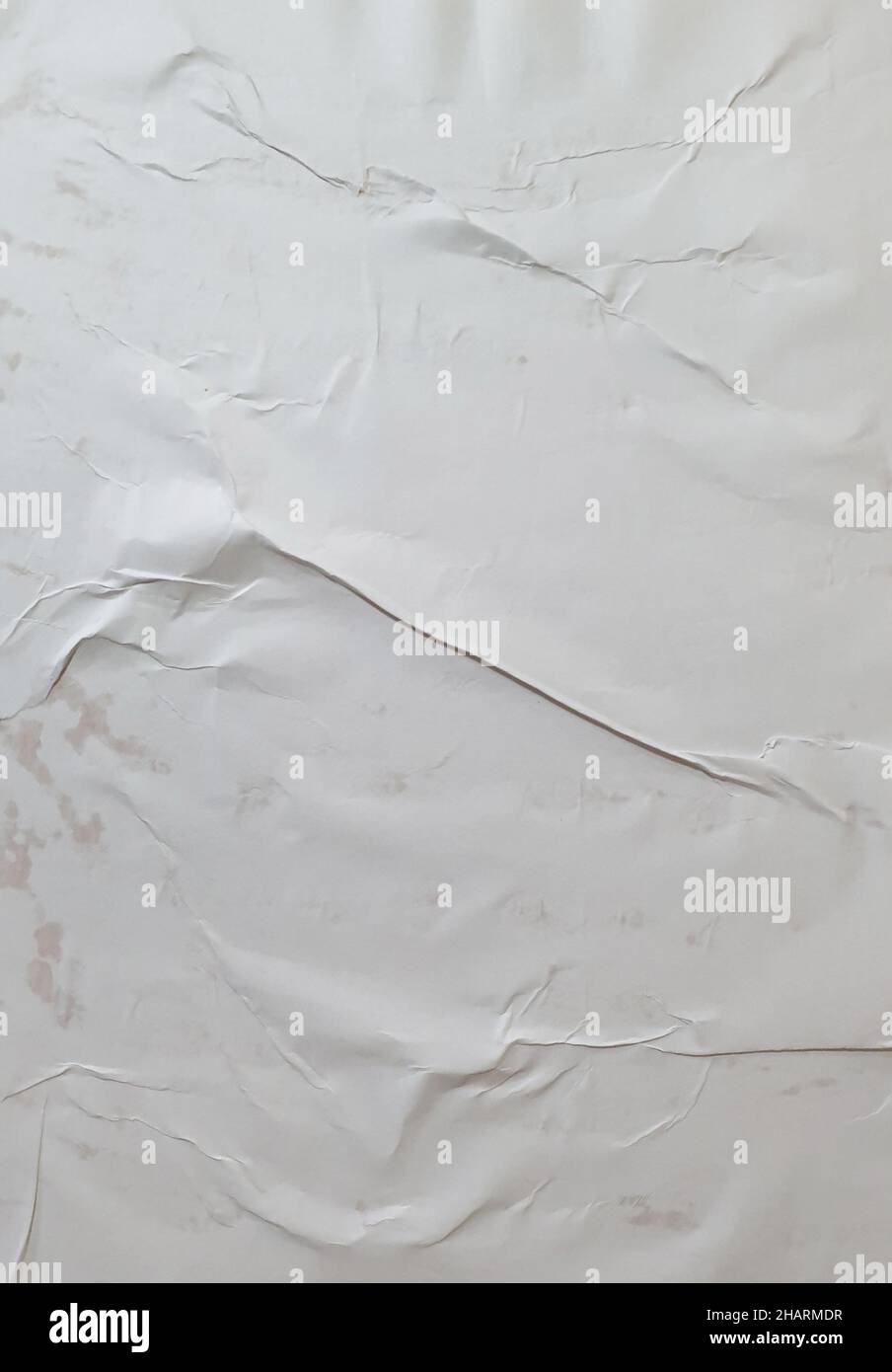 Glued paper for poster texture. Blank white crumpled and wrinkled paper