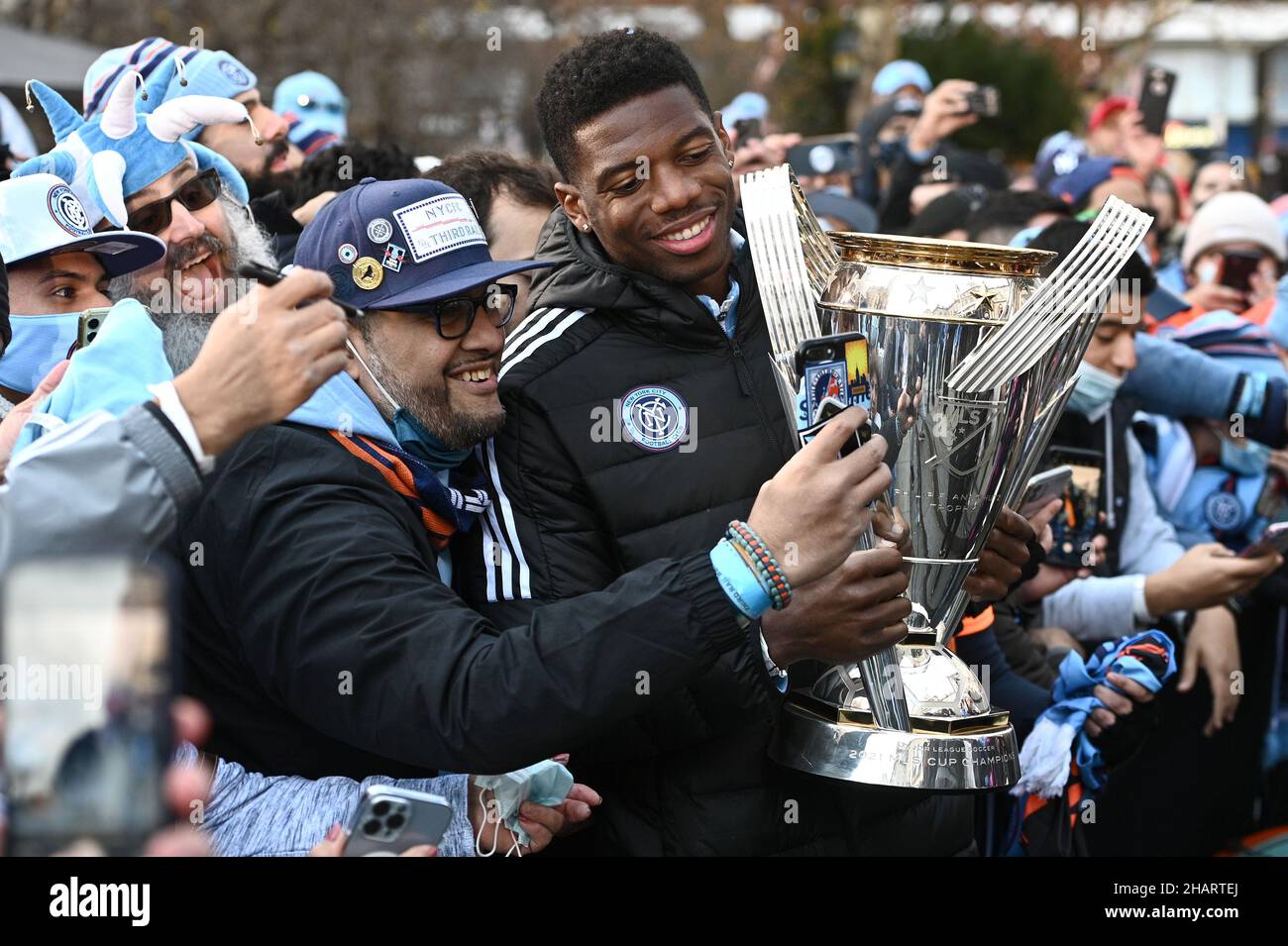 New York City FC's Sean Johnson (c) holds the Philip F. Anschutz Trophy