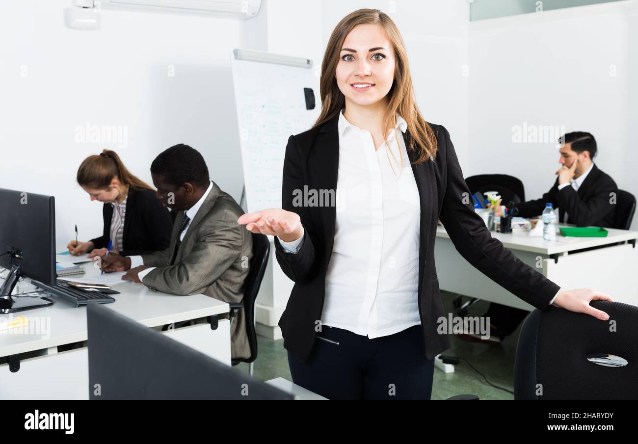 Office lady standing hi-res stock photography and images - Alamy