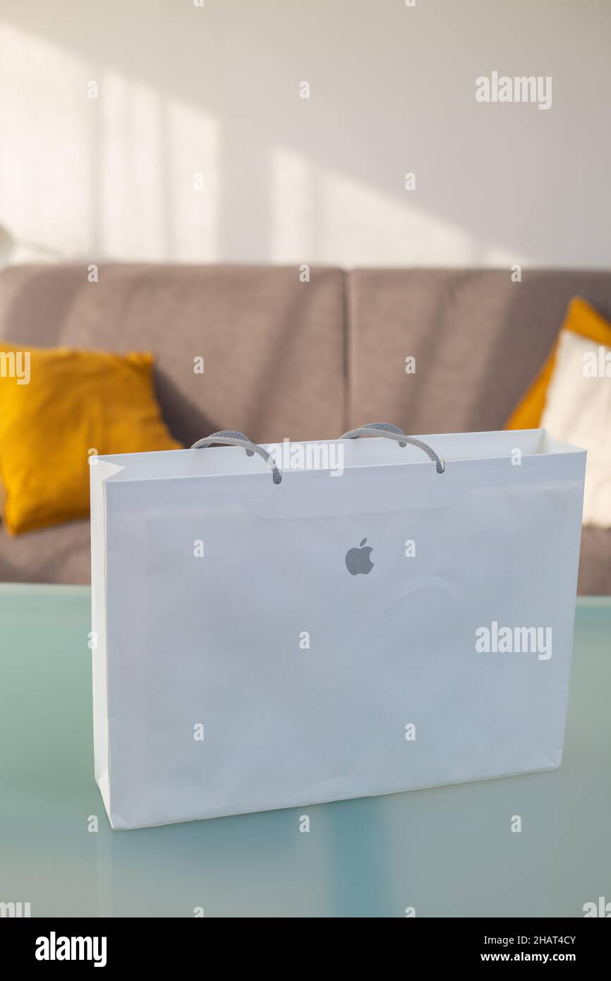 Bologna, Italy: November 11, 2021.Unboxing the new Apple MacBook Pro 14 M1 Pro 2021 laptop out of the box. New laptop in apple packaging on the table Stock Photo