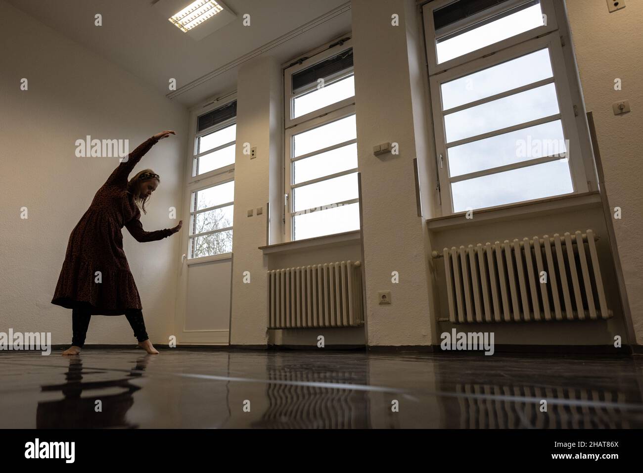 Bremen, Germany. 26th Nov, 2021. The 30-year-old Neele Buchholz from Bremen, actress, inclusion model and dancer, who was born with trisomy 21, dances in her rehearsal room. (to dpa portrait 'Professional dancer with Down syndrome') Credit: Mohssen Assanimoghaddam/dpa/Alamy Live News Stock Photo
