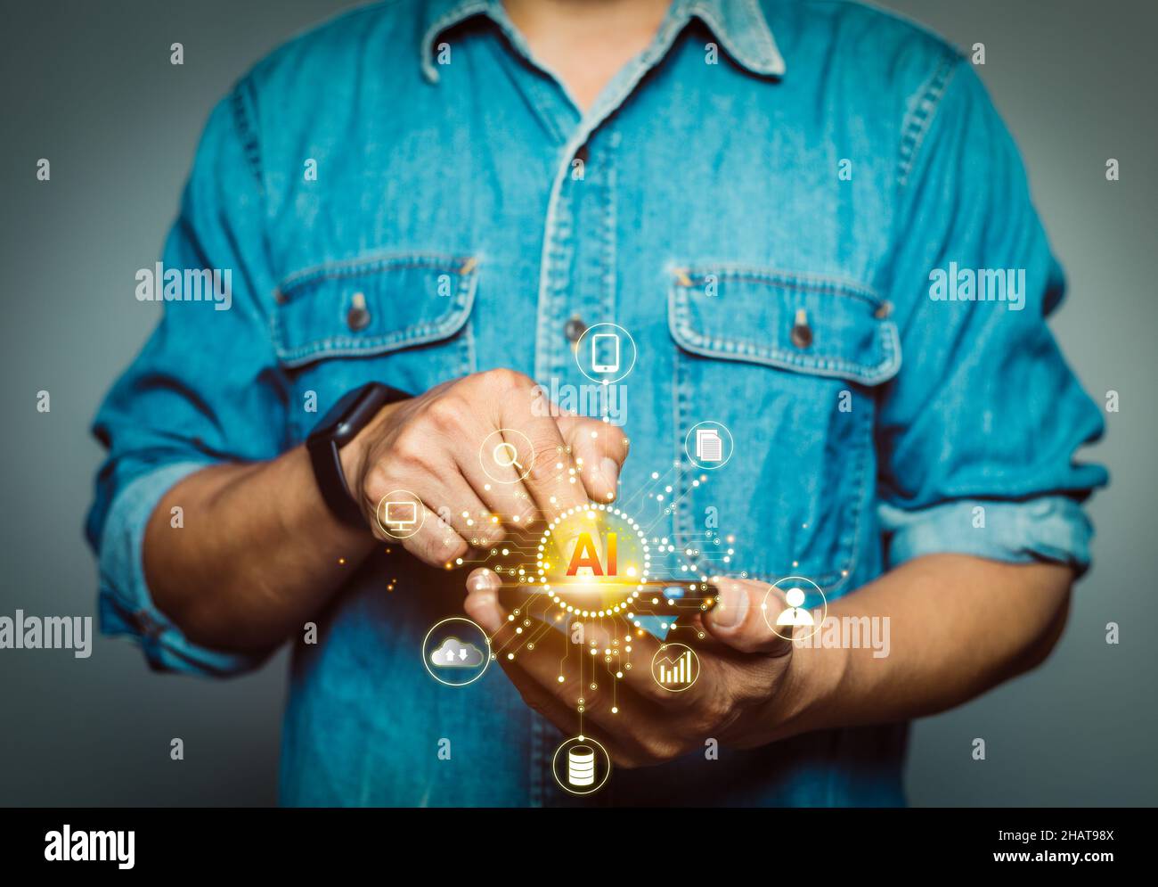 Man using mobile phone showing AI technology icon controlling data network system Stock Photo