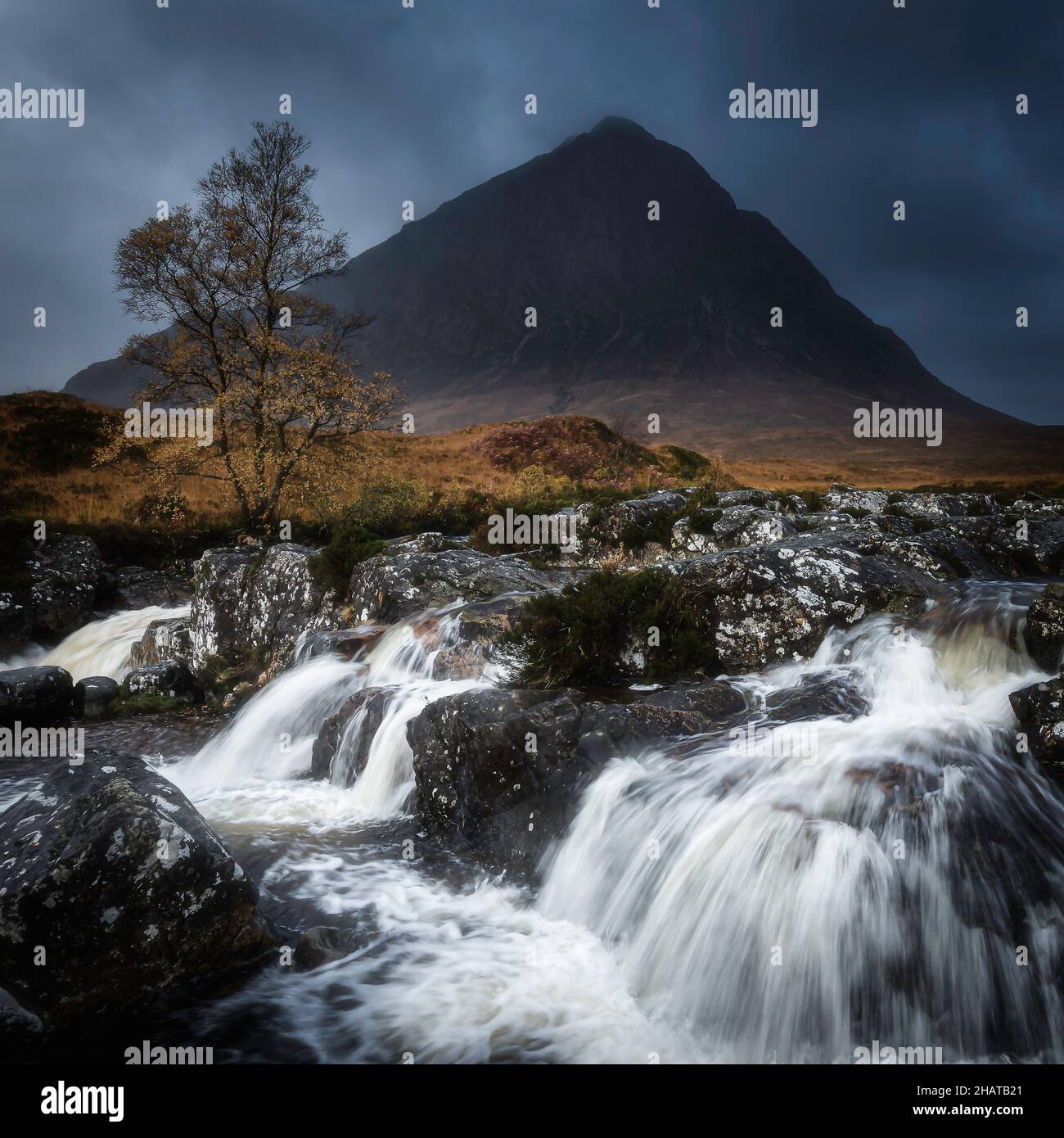 Waterfalls on river Etive and Buahille Etive Mor in autumn.Famous landscape scenery in Glencoe, Scottish Highlands. Stock Photo