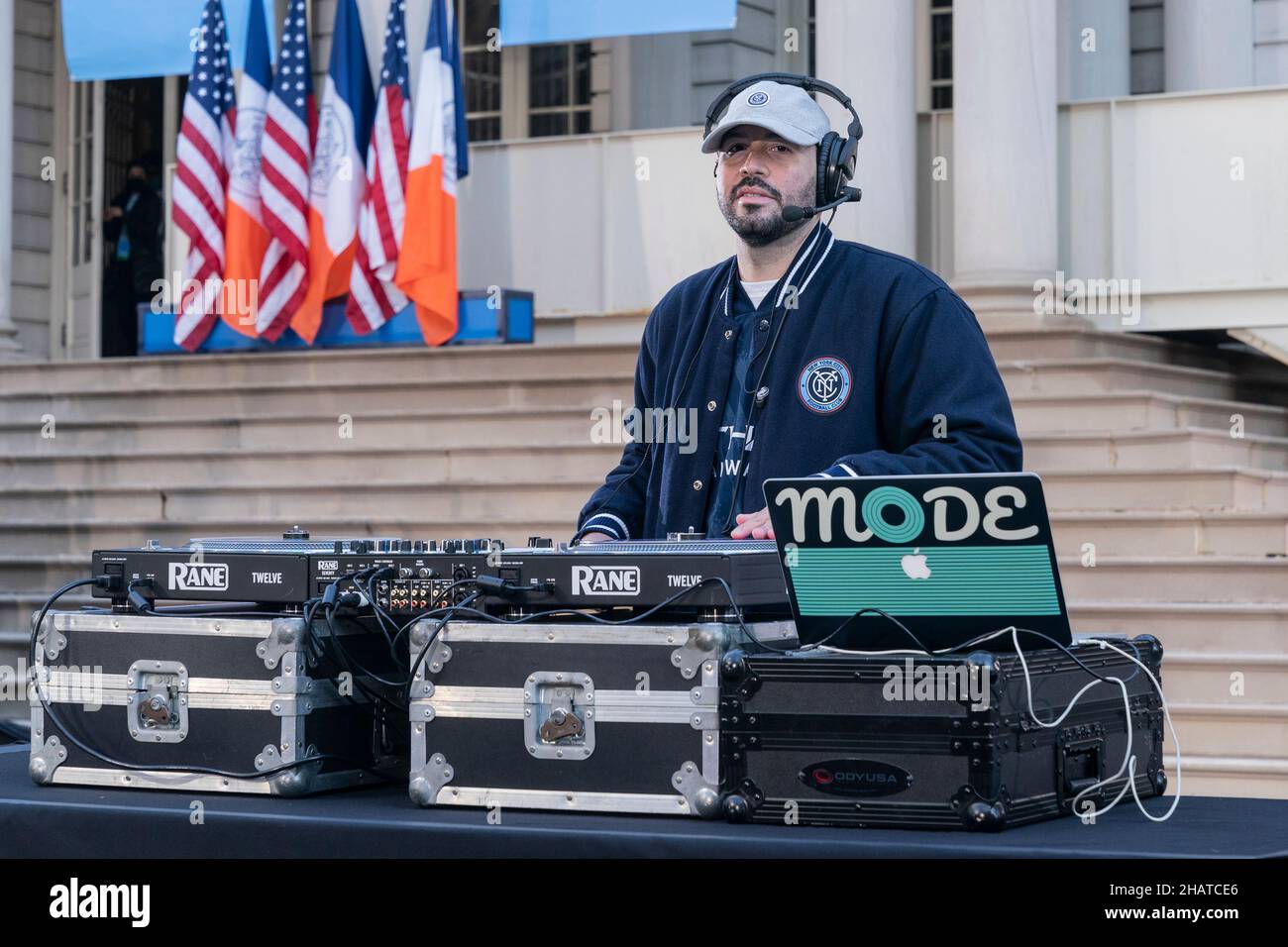 New York, USA. 14th Dec, 2021. DJ Mode performs during celebration for NYCFC winning the 2021 MLS Cup on City Hall steps in New York on December 14, 2021. NYCFC finished the regular season in 4th place and played almost all playoff games away. Winning the MLS Cup is the first trophy won by the franchise since it was established 7 years ago. NYCFC is part of the City Football Group which owns football clubs around the world. (Photo by Lev Radin/Sipa USA) Credit: Sipa USA/Alamy Live News Stock Photo