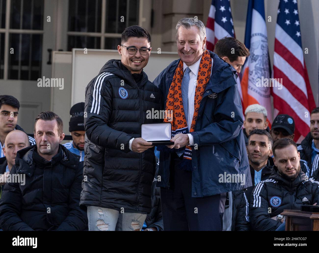 New York, USA. 14th Dec, 2021. Goalkeeper Luis Barraza received Keys to the City from mayor Bill de Blasio during celebration for NYCFC winning the 2021 MLS Cup on City Hall steps in New York on December 14, 2021. NYCFC finished the regular season in 4th place and played almost all playoff games away. Winning the MLS Cup is the first trophy won by the franchise since it was established 7 years ago. NYCFC is part of the City Football Group which owns football clubs around the world. (Photo by Lev Radin/Sipa USA) Credit: Sipa USA/Alamy Live News Stock Photo