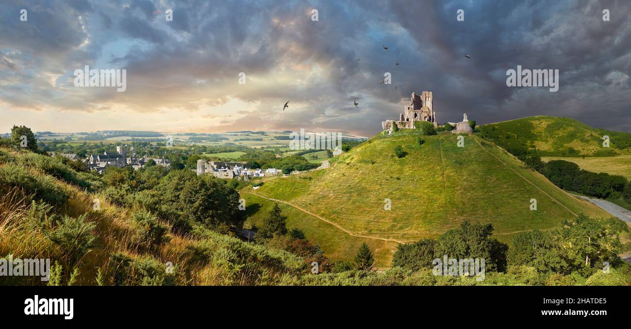 Medieval Corfe castle keep & battlements at sunrise, built in 1086 by William the Conqueror, Dorset England.  Corfe Castle is a fortification standing Stock Photo