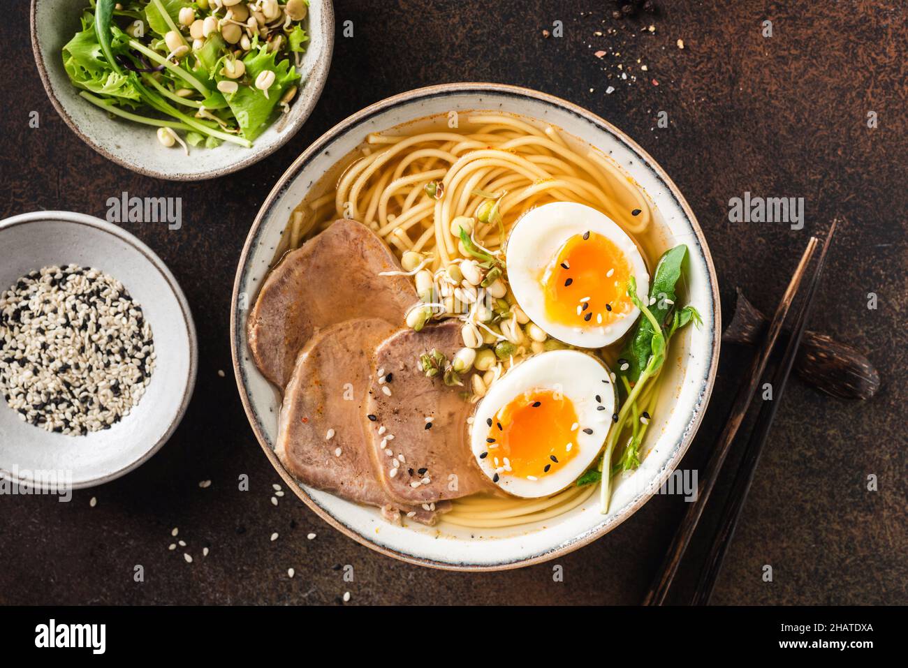 Ramen noodles bowl with pork and egg top view Stock Photo