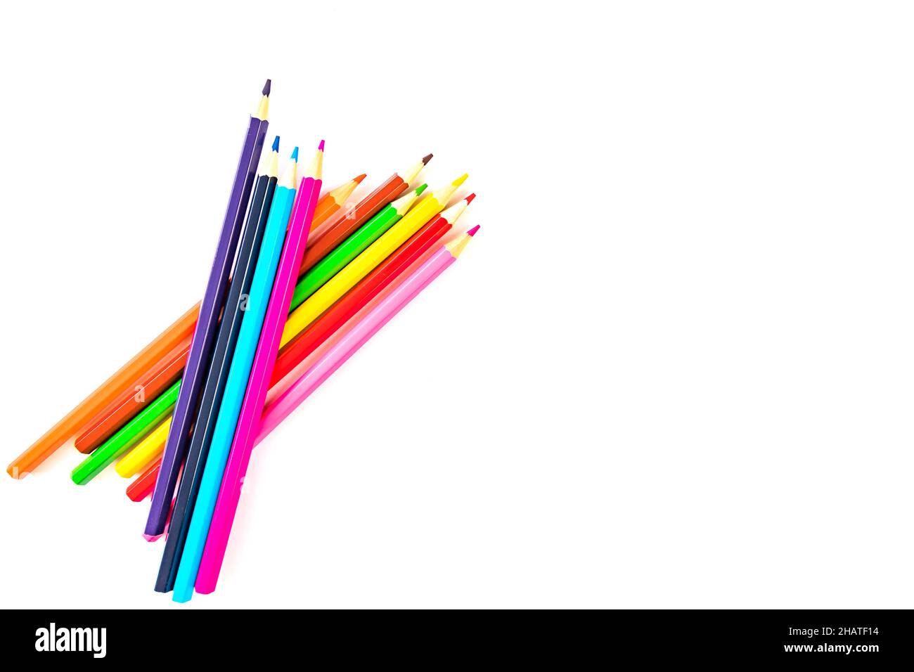 Pack of colored rainbow pencils isolated on white background. Back to school painting concept. Top view Stock Photo