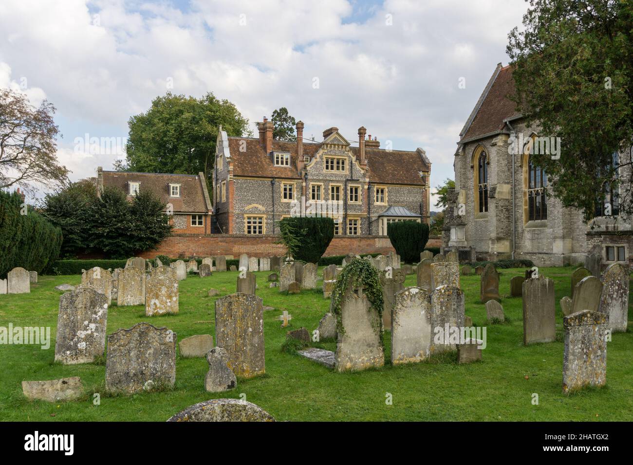 Old weathered headstones in the churchyard of All Saints, Marlow, Buckinghamshire, UK Stock Photo