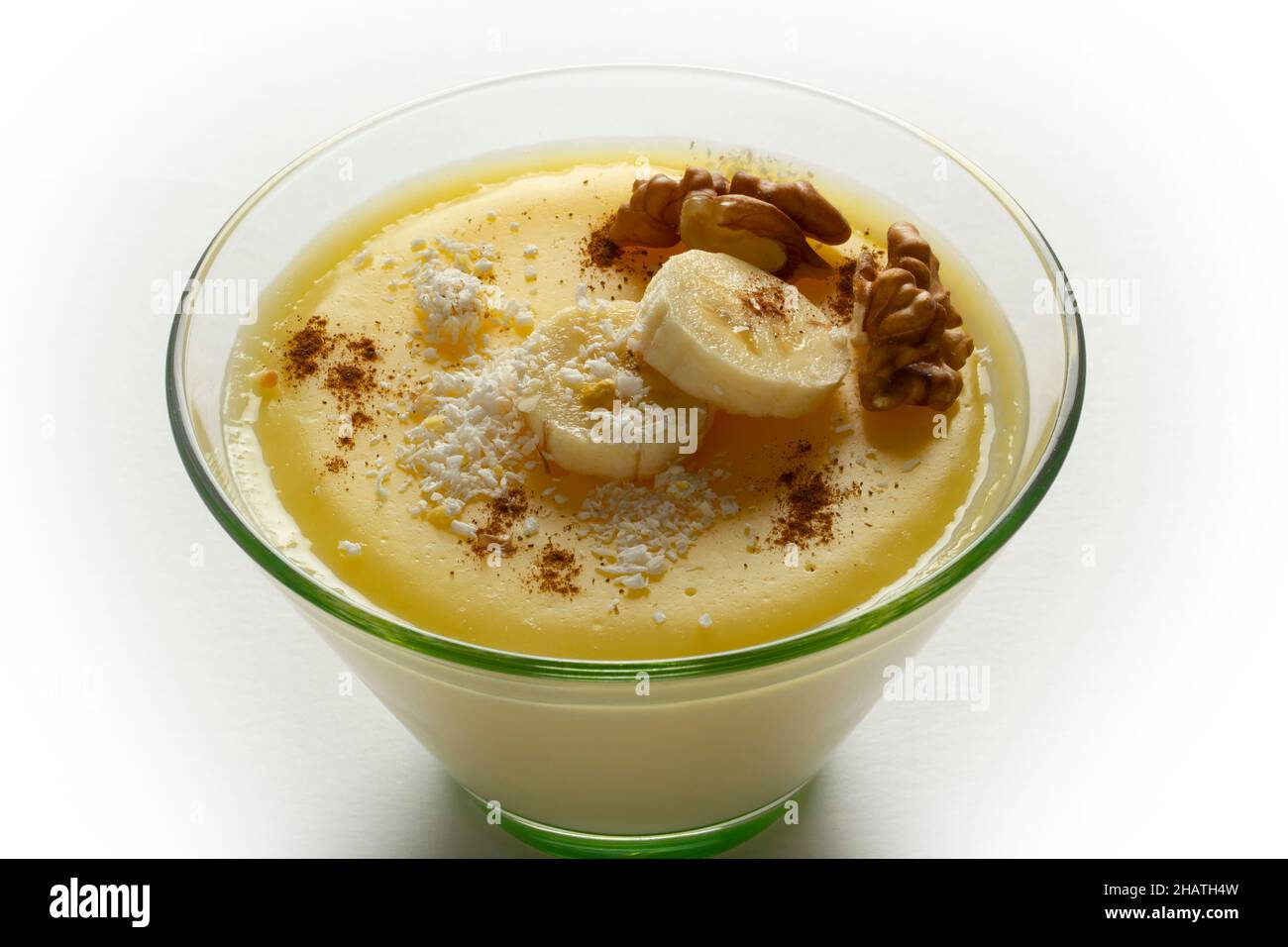 Milk and banana pudding. With coconut and cinnamon Stock Photo - Alamy