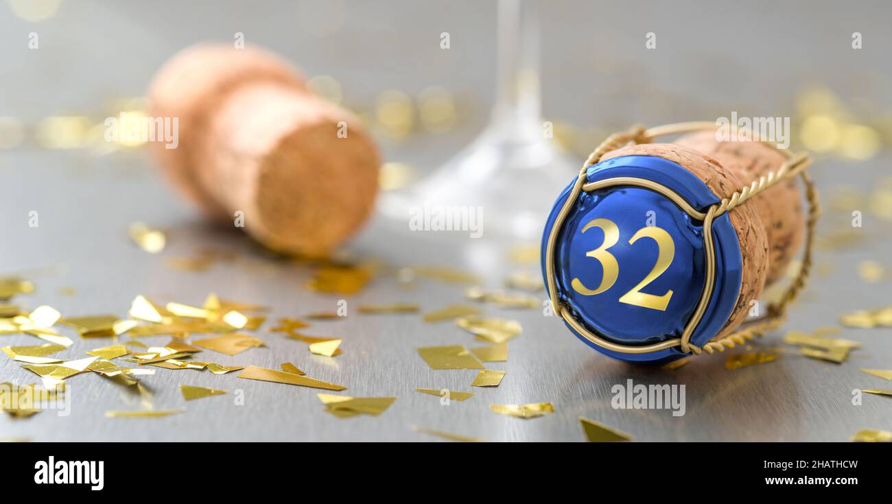 Champagne cap with the Number 32 Stock Photo