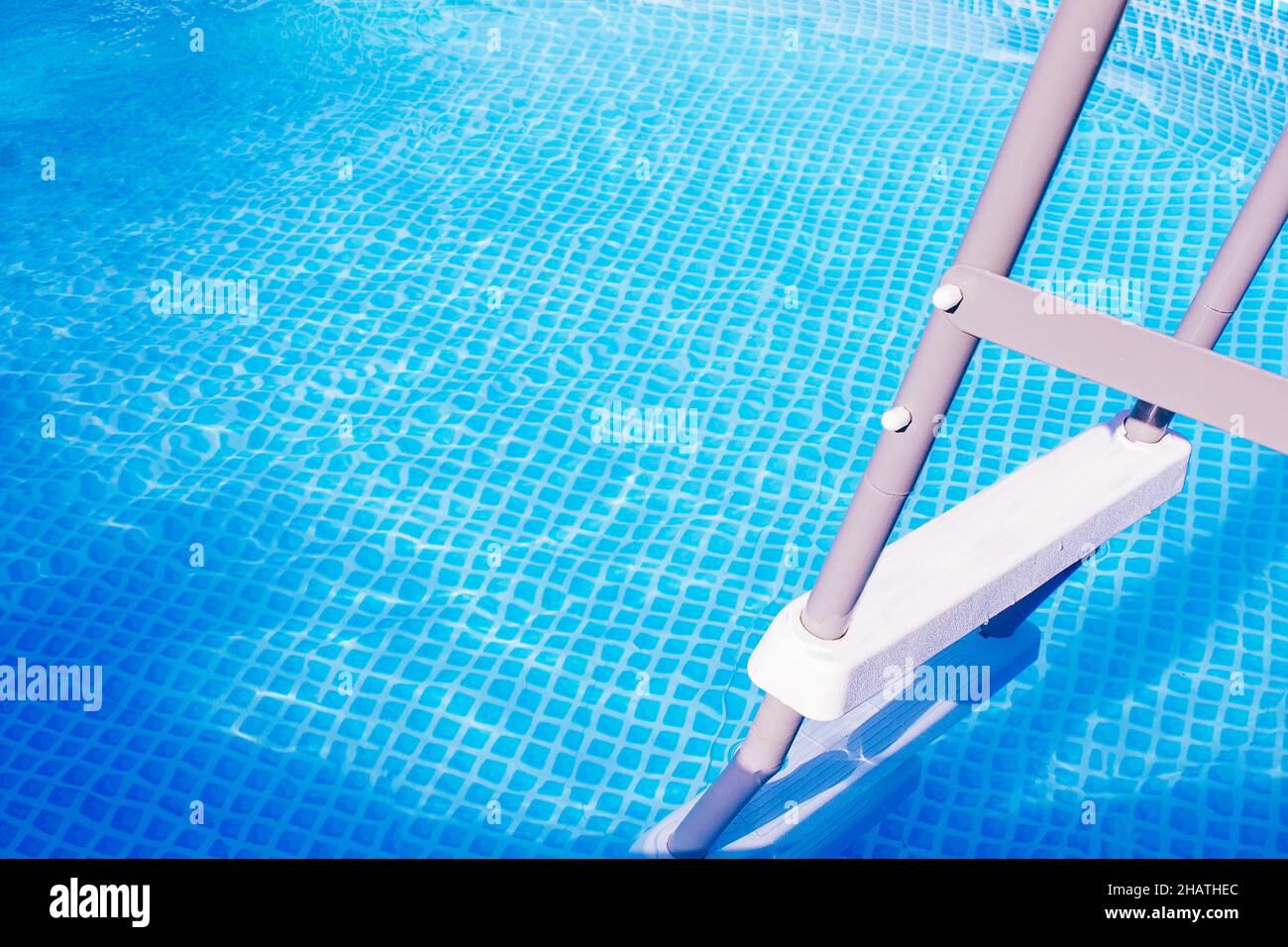 Banner. Plastic white staircase in prefabricated pool.  Stock Photo
