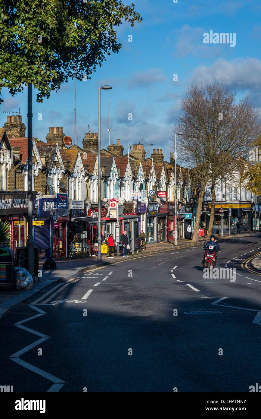 A row of houses and shops on Hoe Street, Walthamstow, London, England