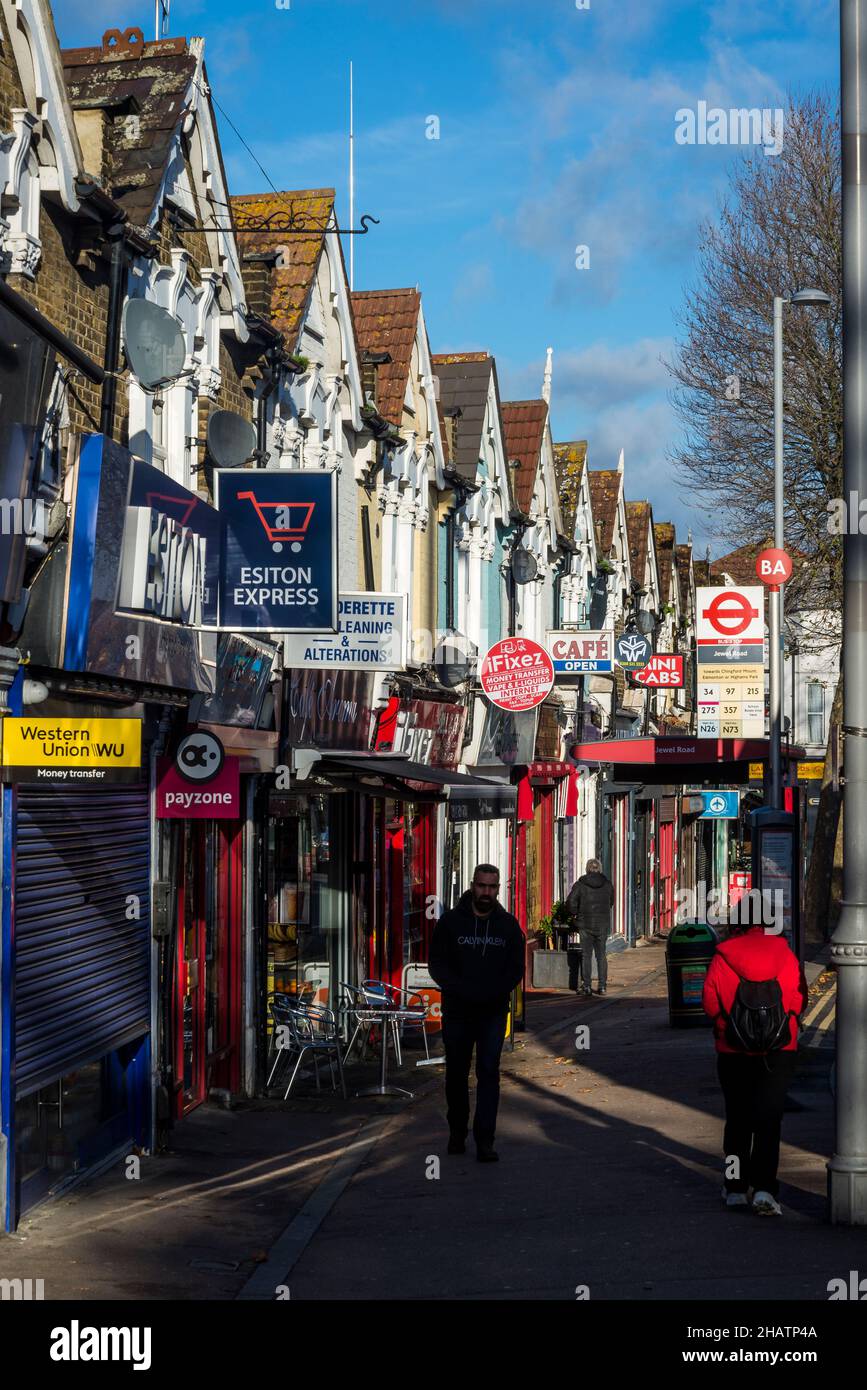 A row of houses and shops on Hoe Street, Walthamstow, London, England