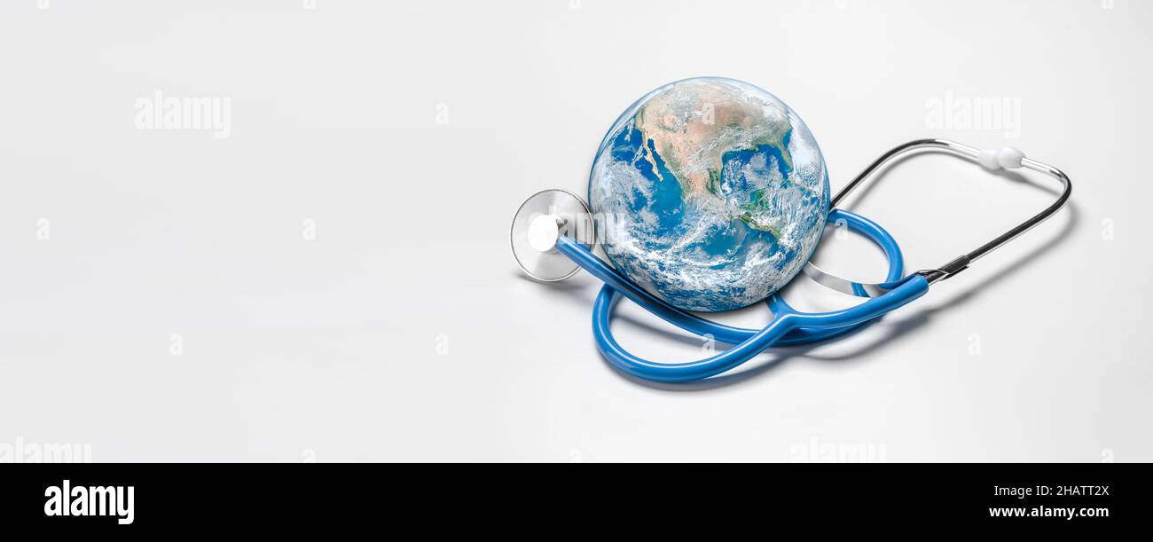 Global human health in context of coronavirus pandemic. Stethoscope wrapped around globe Earth on white background. banner. Elements of this image wer Stock Photo