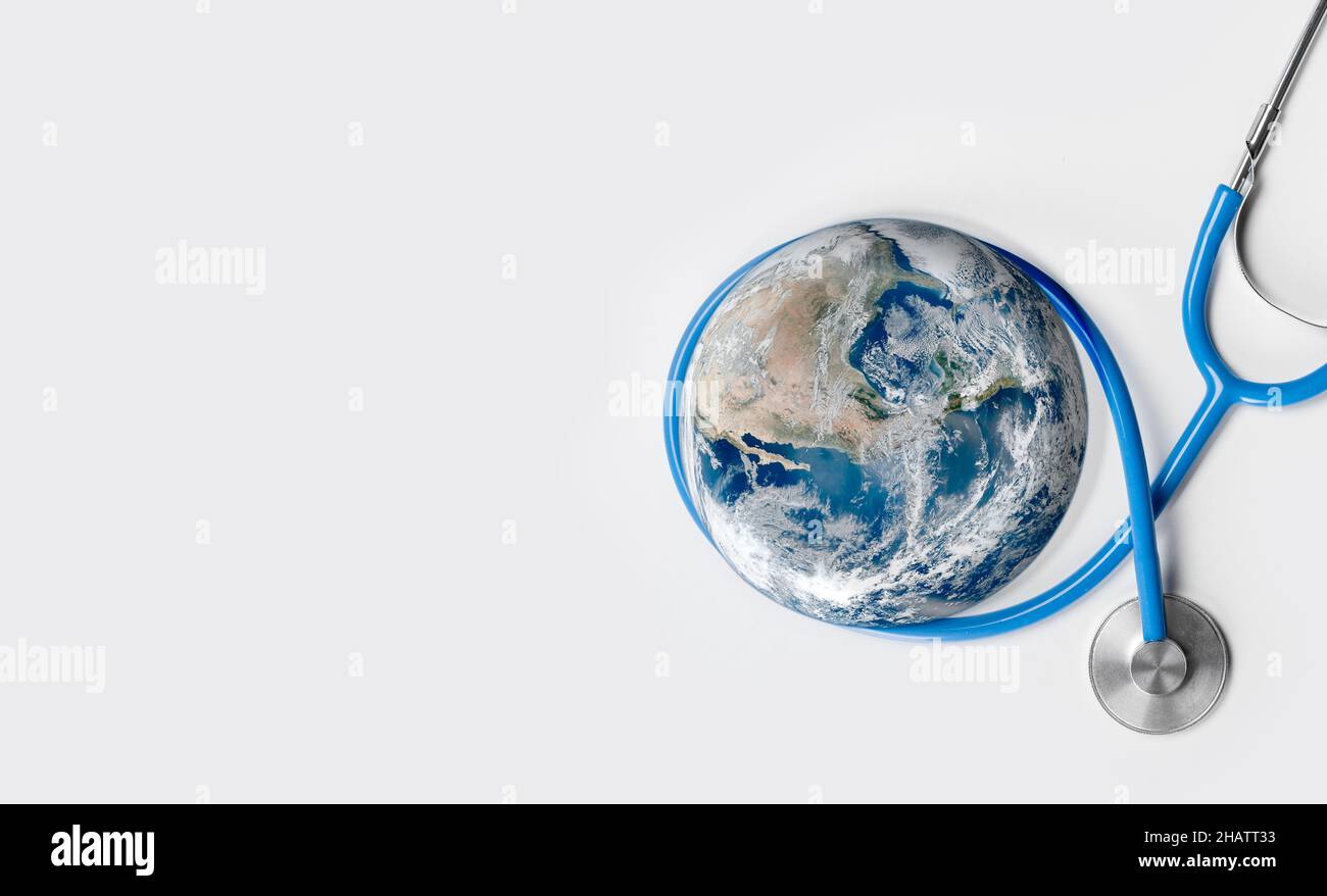 Stethoscope listening planet Earth. Global Healthcare. Globe and stethoscope. copy space. Elements of this image were furnished by NASA Stock Photo