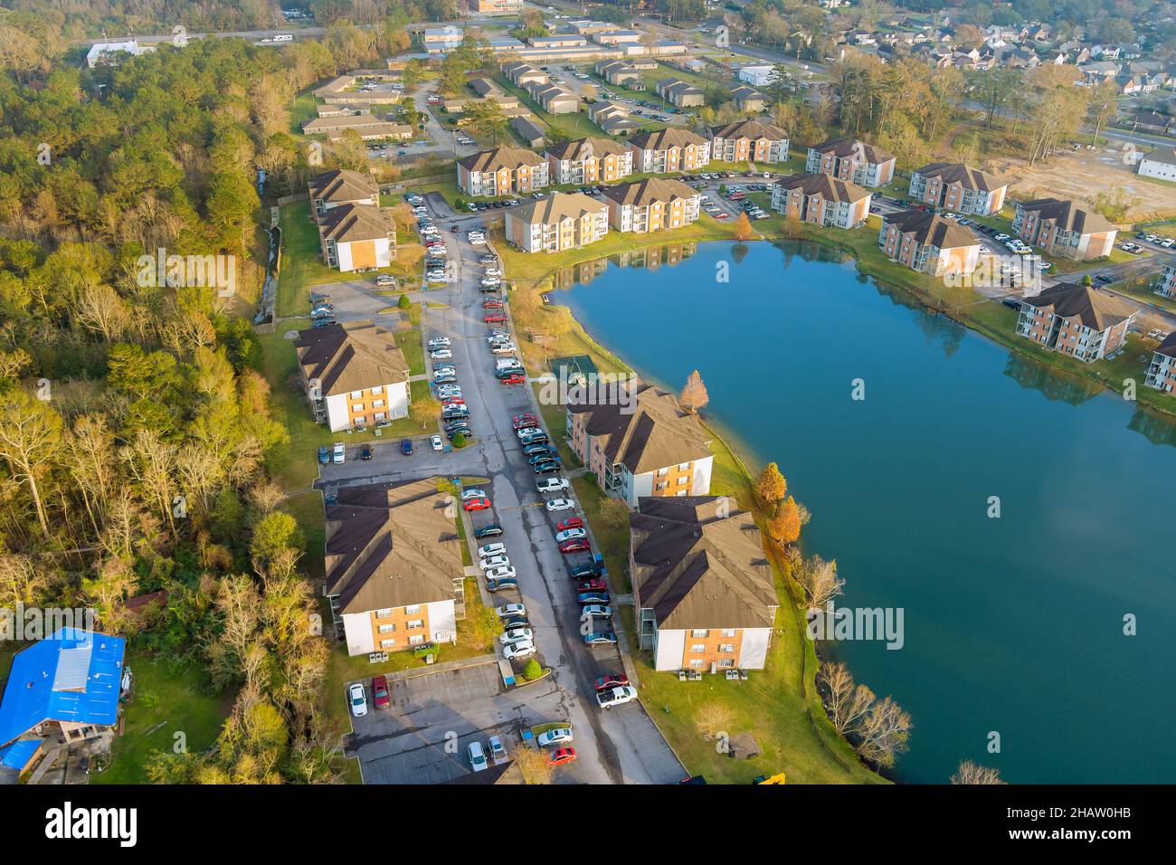 Autumn season residential street, apartment complex near pond from above American small town in Denham Springs Louisiana Stock Photo