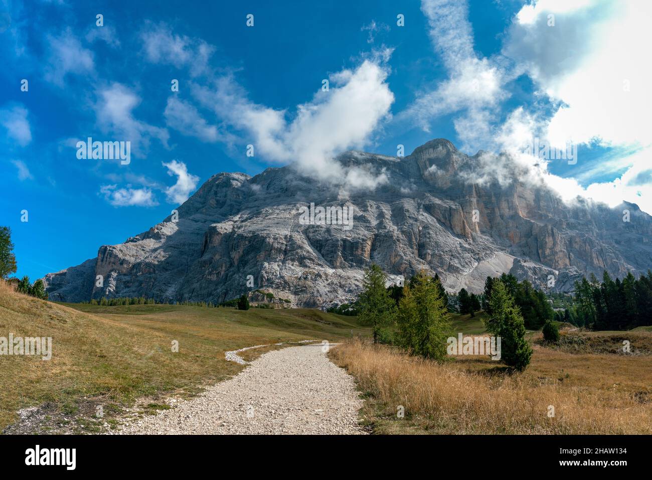 Hiking path from Armentara meadows  to Heiligkreuz sanctuary underneath Sasso di Santa Croce in the italian Dolomites Stock Photo