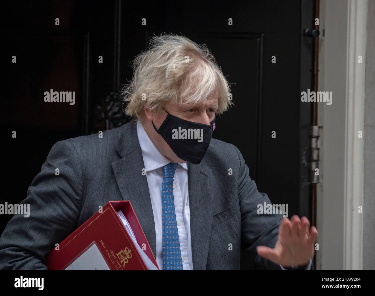 10 Downing Street, London, UK. 15 December 2021. British Prime Minister Boris Johnson wearing a facemask leaves 10 Downing Street to attend the final weekly Prime Ministers Questions, PMQs, in Parliament before Christmas recess the day after many Conservative back-benchers effectively gave him a vote of no confidence. Credit: Malcolm Park/Alamy Live News Stock Photo