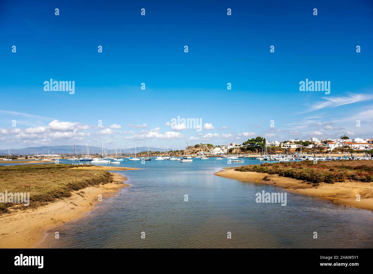 Coastal summer landscape with boats in Alvor, Algarve, Portugal Stock Photo