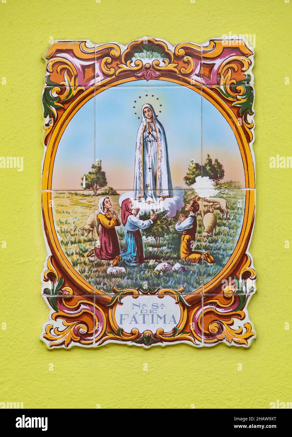 Typical Portuguese tile painting with saint motifs at the house