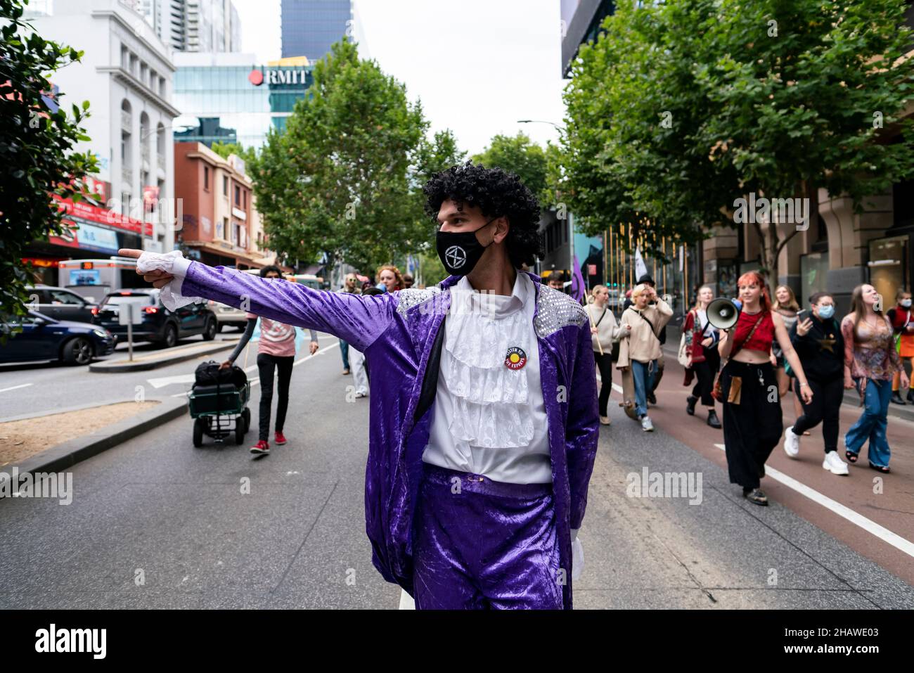 Extinction Rebellion activists dance to bee Gees Stayin' Alive in Melbourne. Stock Photo