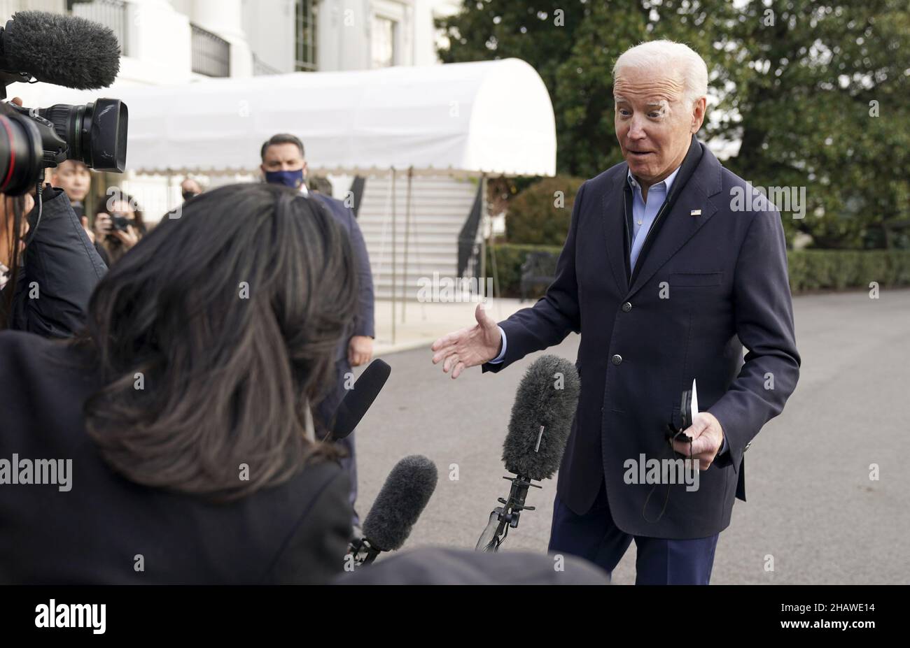 Washington, United States. 15th Dec, 2021. President Joe Biden speaks to media as he walks toward Marine One en route to Joint Base Andrews where he will depart to Fort Campbell, Kentucky and then on to Mayfield and Dawson Springs, Kentucky to survey storm damage following extreme weather events at the White House in Washington, DC on Wednesday, December 15, 2021. A series of storms hit states across the Midwest and the South leaving entire communities in Kentucky destroyed. Photo by Leigh Vogel/UPI . Credit: UPI/Alamy Live News Stock Photo