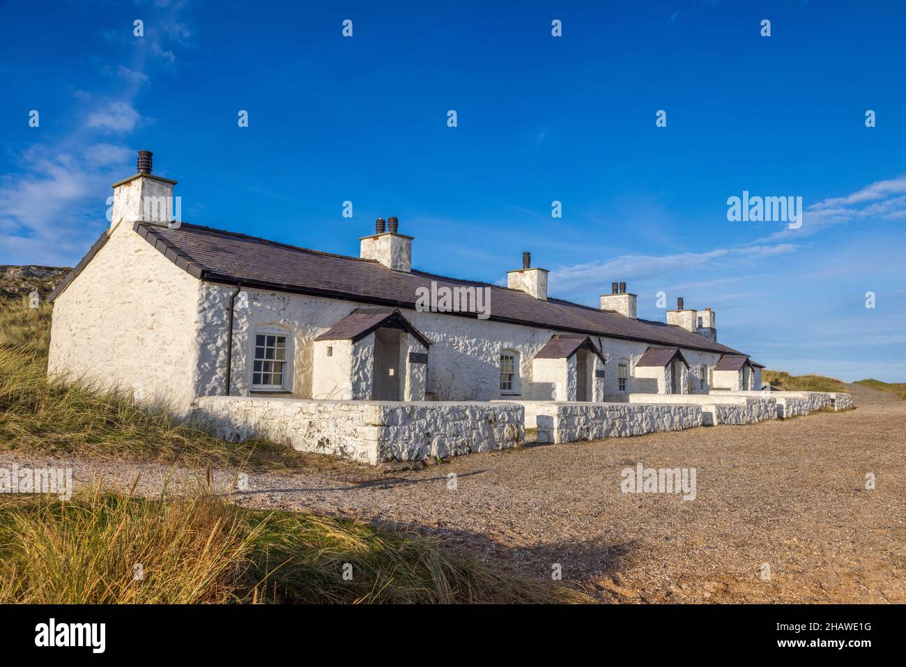 Pilots cottages on Ynys Llanddwyn, Isle of Anglesey, North Wales Stock Photo