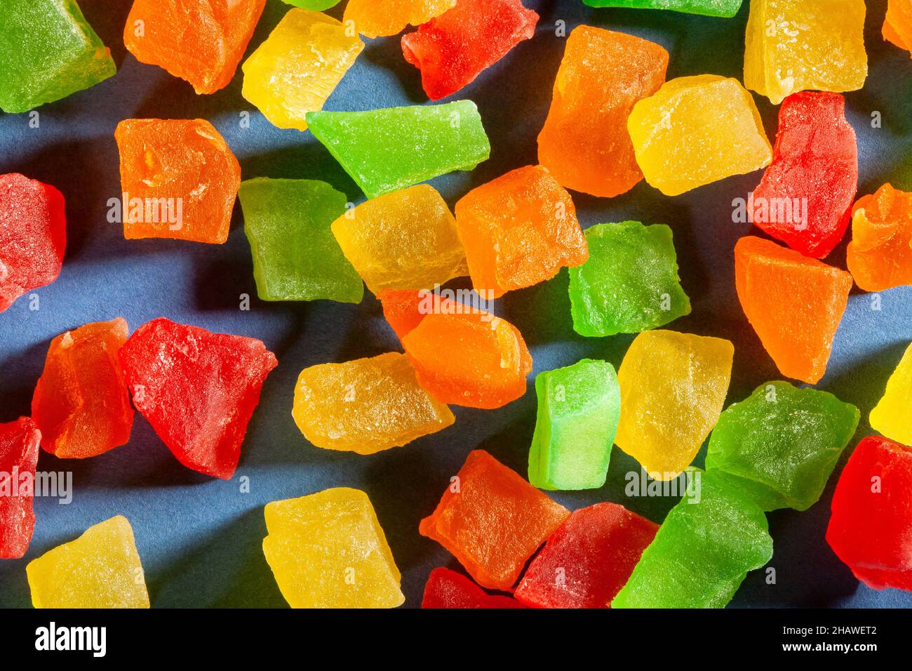 candied fruit on blue background Stock Photo