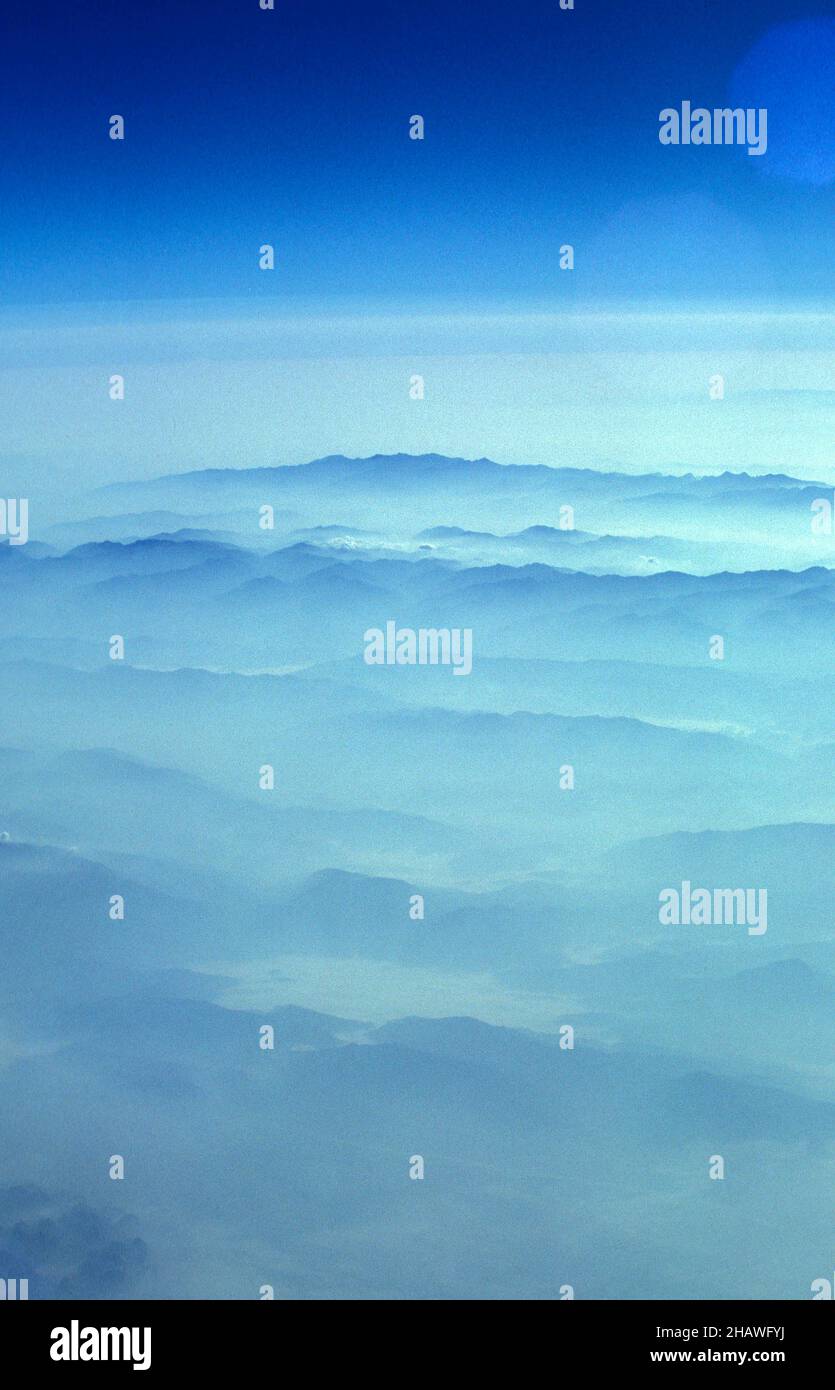 a view from a airplane over the mountains of west China.  China, Beijing, October, 1997 Stock Photo