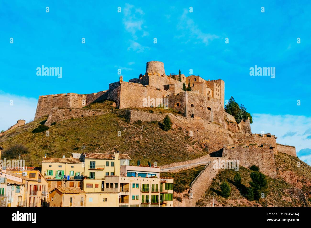 a panoramic view of the old town of Cardona, in Catalonia, Spain, highlighting the medieval Castle of Cardona at the top of the hill Stock Photo