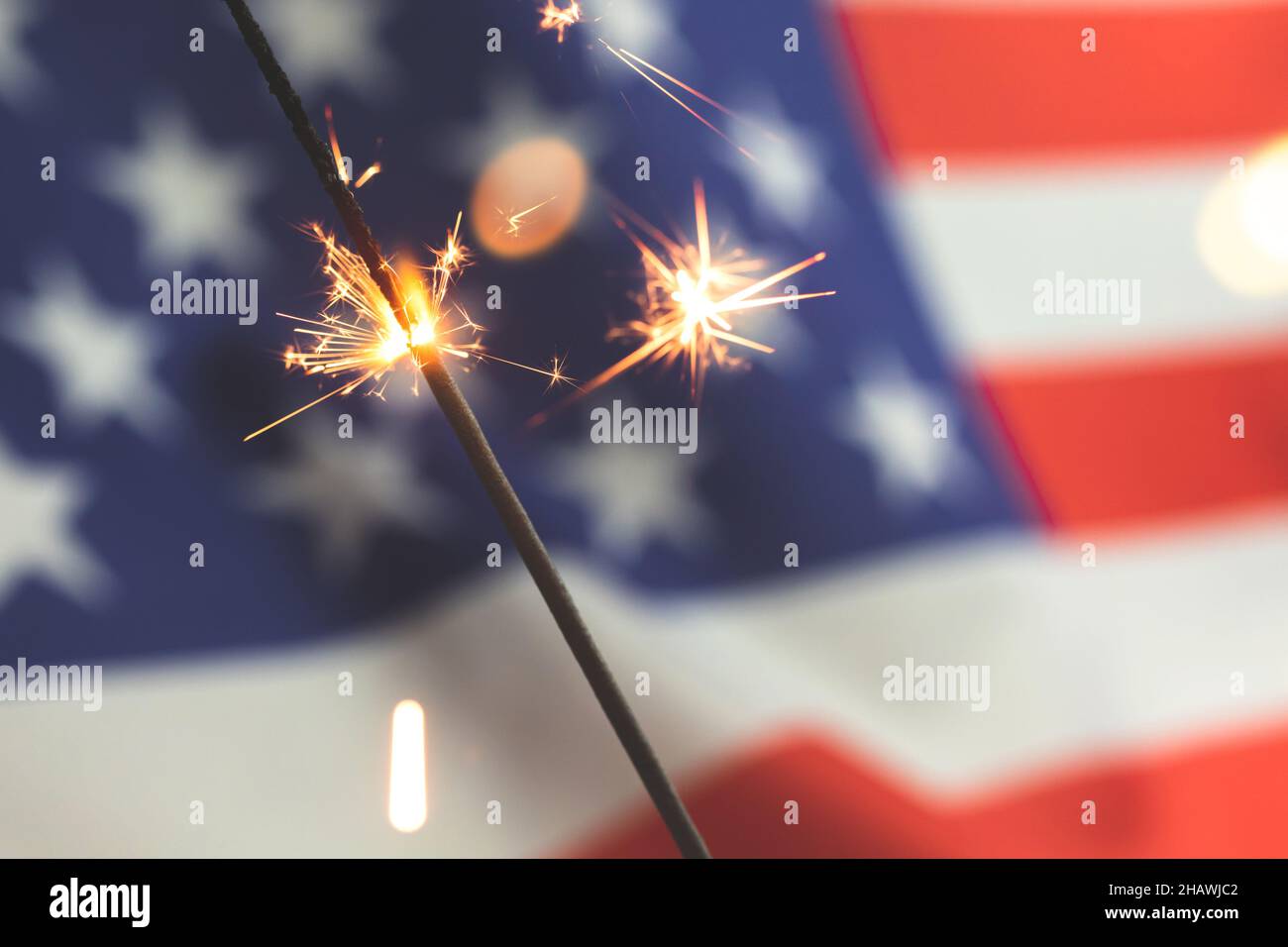American flag and sparklers. USA, 4th of July celebration background ...