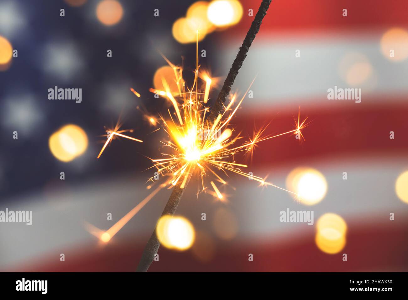 American flag and sparklers with bokeh. USA, 4th of July celebration ...