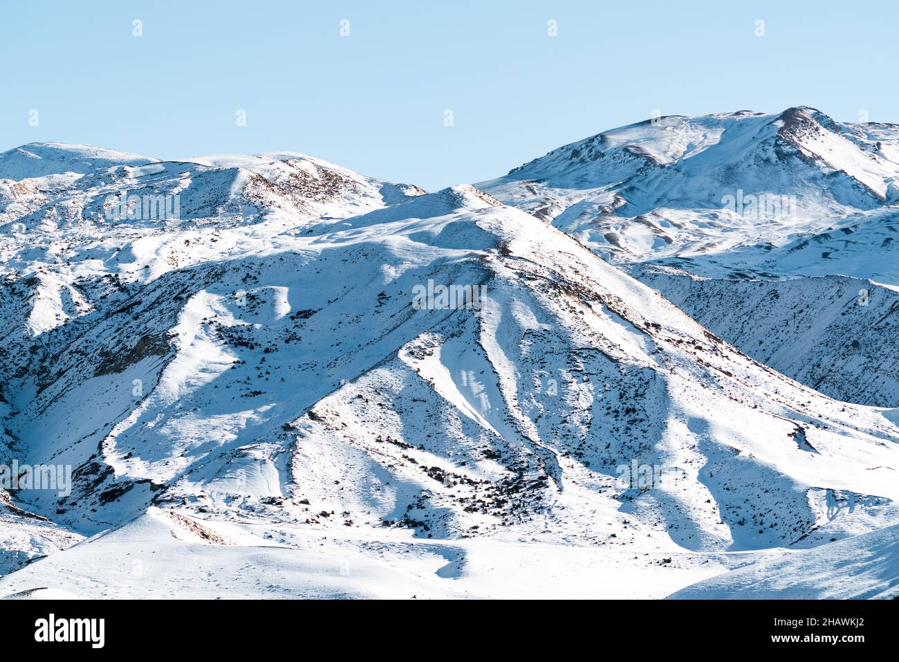 Mountain peaks covered with snow Stock Photo - Alamy