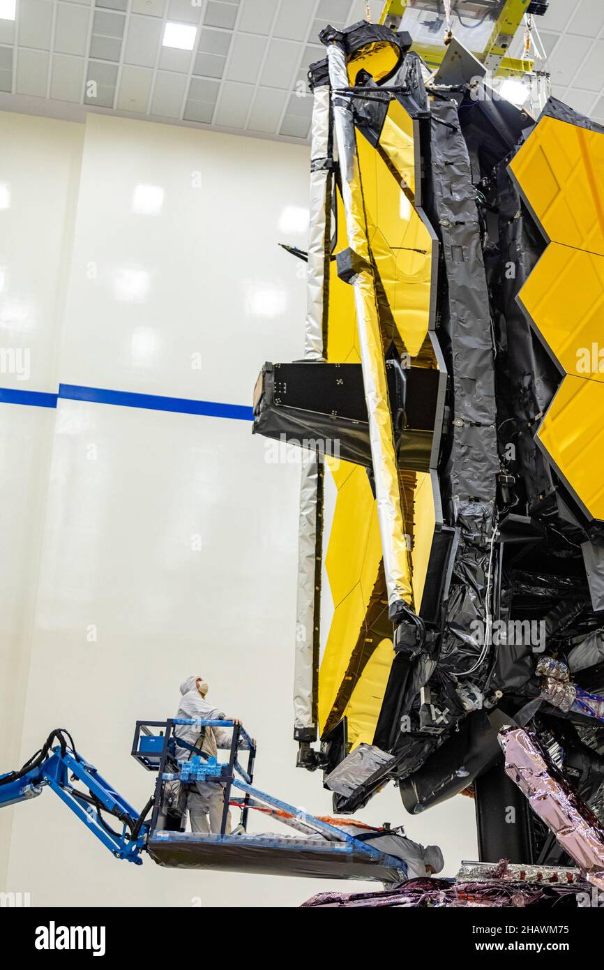 During final testing, the James Webb Space Telescope (JWST) is pictured, fully expanding and locking into place, just as it would in space. The conclusion of this test represents the team's final checkpoint in a long series of tests designed to ensure Webb's 18 hexagonal mirrors are prepared for a long journey in space. After this, all of Webb's many movable parts will have confirmed in testing that they can perform their intended operations after being exposed to the expected launch environment. As of December 15, 2021, the JWST team was working on a communication issue between the observator Stock Photo
