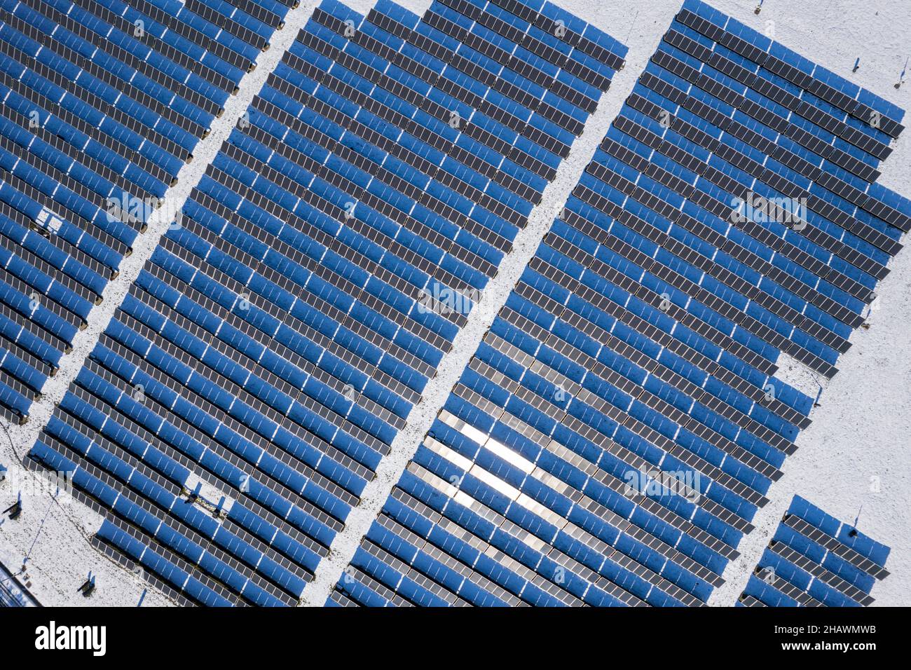 Aerial view of solar panels on a sunny winter day Stock Photo