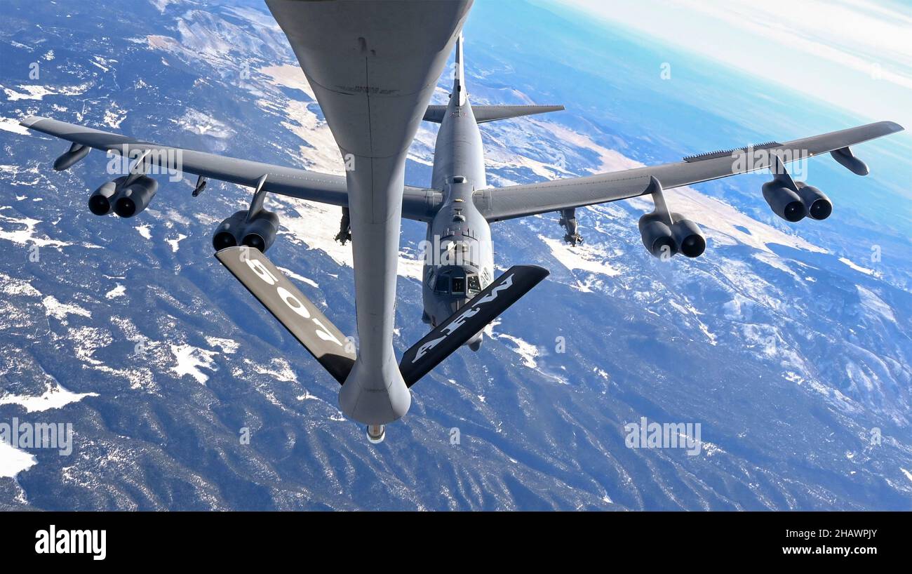 Rocky Mountains, United States. 13 December, 2021. A U.S. Air Force B-52 Stratofortress strategic bomber assigned to the 96th Bomb Squadron prepares to refuel from a KC-135 Stratotanker over the Rocky Mountains December 13, 2021 Colorado, USA.  Credit: 2Lt. Mary Begy/US Air Force/Alamy Live News Stock Photo