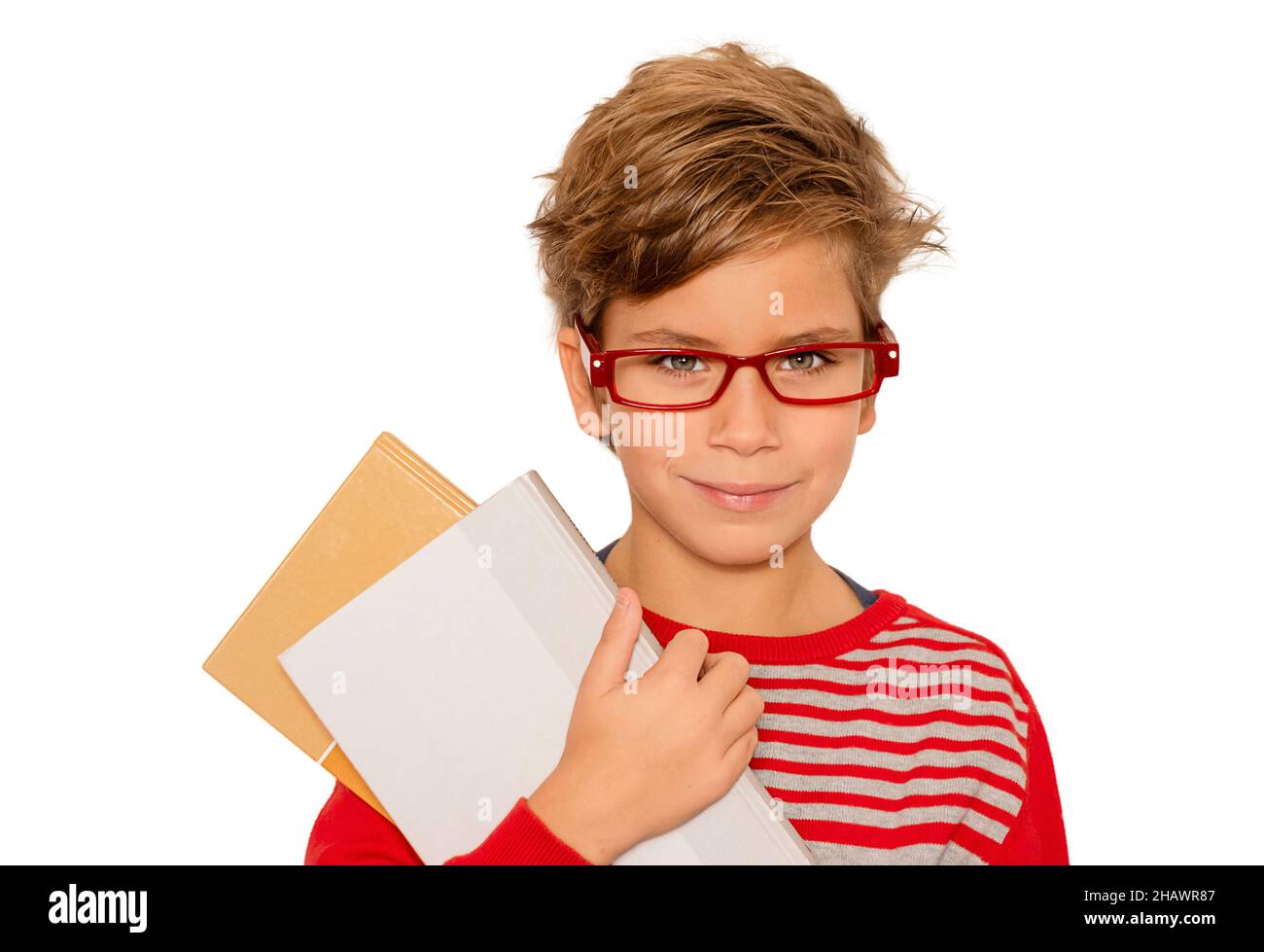 smart boy with blonde hair and glasses holds books in his hands isolated on white Stock Photo