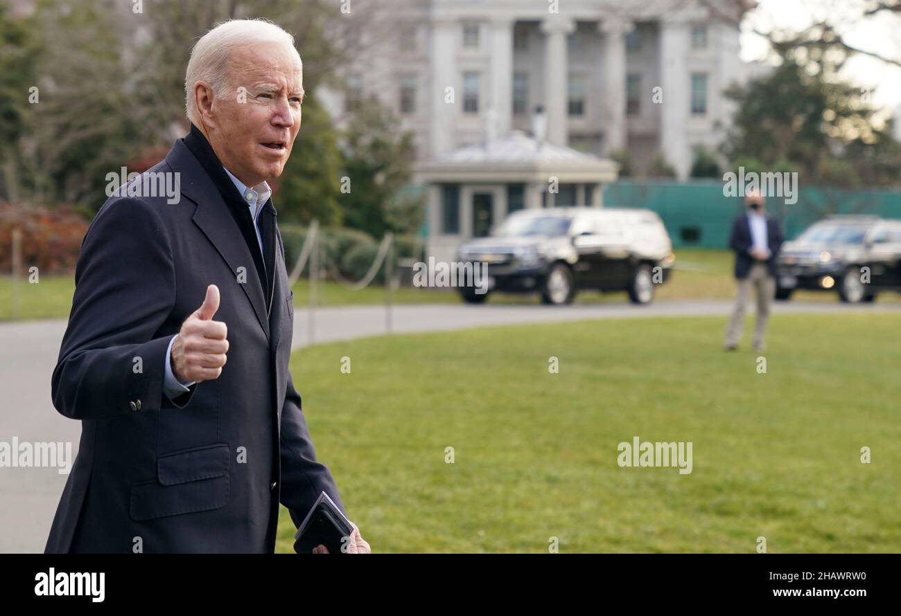 washington, DC, US, 15/12/2021, United States President Joe Biden walks toward Marine One en route to Joint Base Andrews where he will depart to Fort Campbell, Kentucky and then on to Mayfield and Dawson Springs, Kentucky to survey storm damage following extreme weather events at the White House in Washington, DC on Wednesday, December 15, 2021. A series of storms hit states across the Midwest and the South leaving entire communities in Kentucky destroyed. Credit: Leigh Vogel/Pool via CNP /MediaPunch Stock Photo