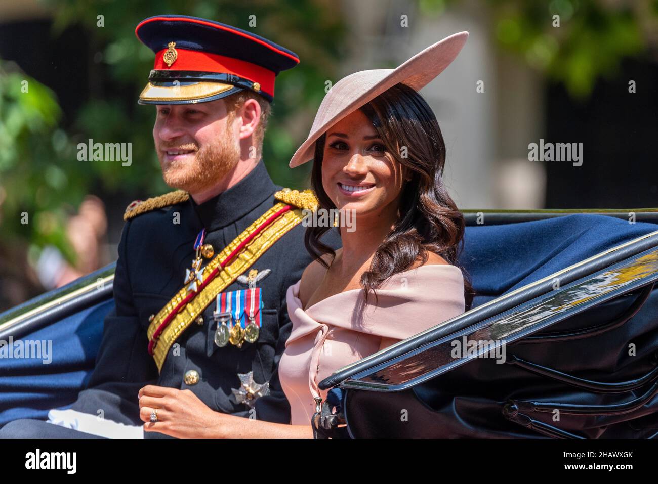 Meghan Markle, Duchess of Sussex, and Prince Harry, Duke of Sussex in carriage on The Mall, London, for Trooping the Colour 2018. Fashion outfit Stock Photo