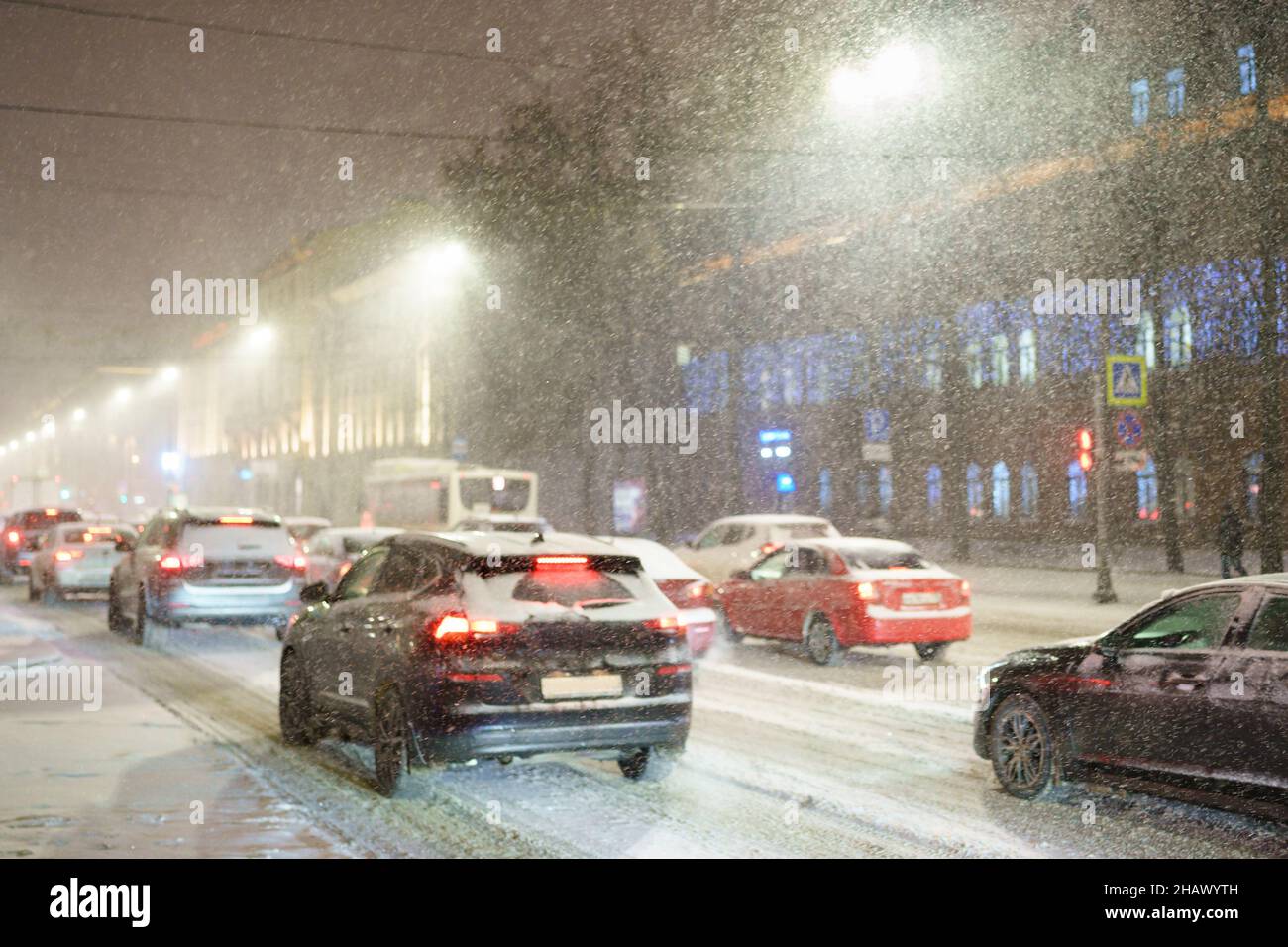 Blizzard on road in winter. Heavy snowfall paralyze city streets at ...