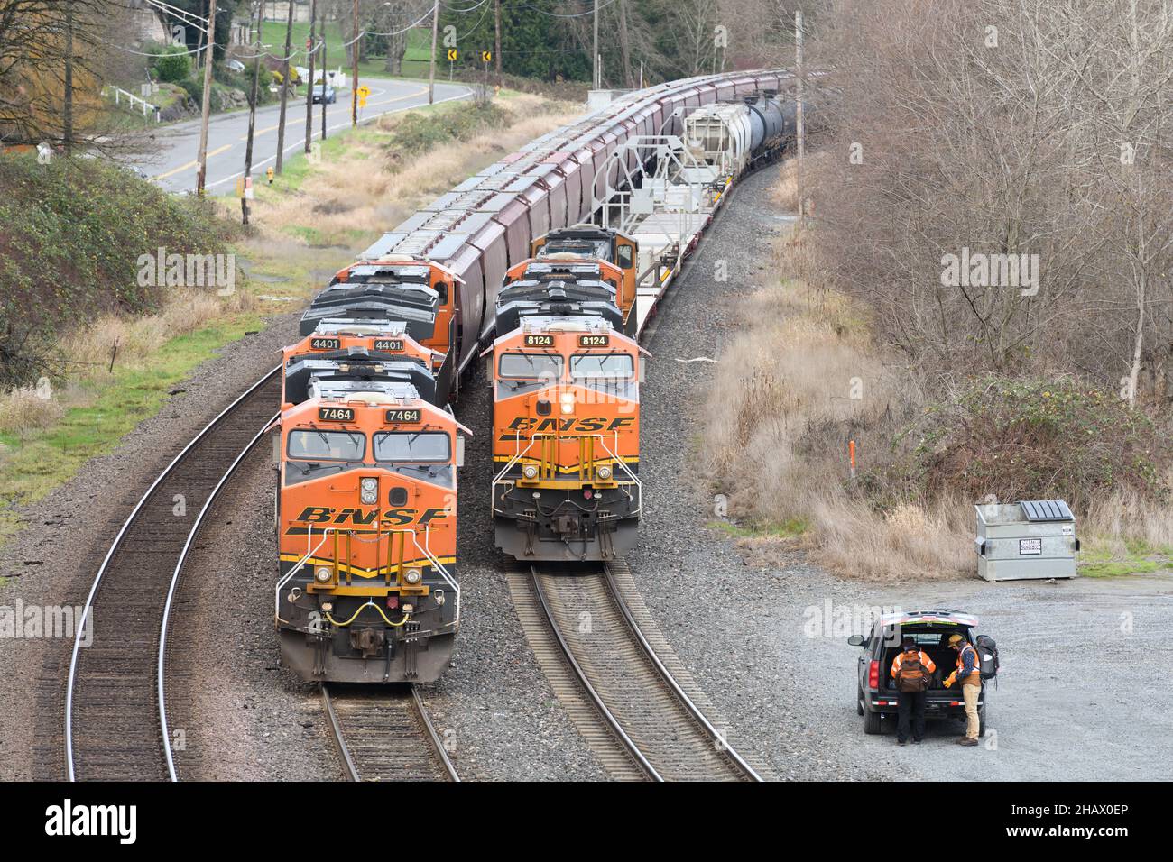 Everett, WA, USA - December 14, 2021; A pair of BNSF freight trains wait at Lowell in Everett Washington for a crew change Stock Photo