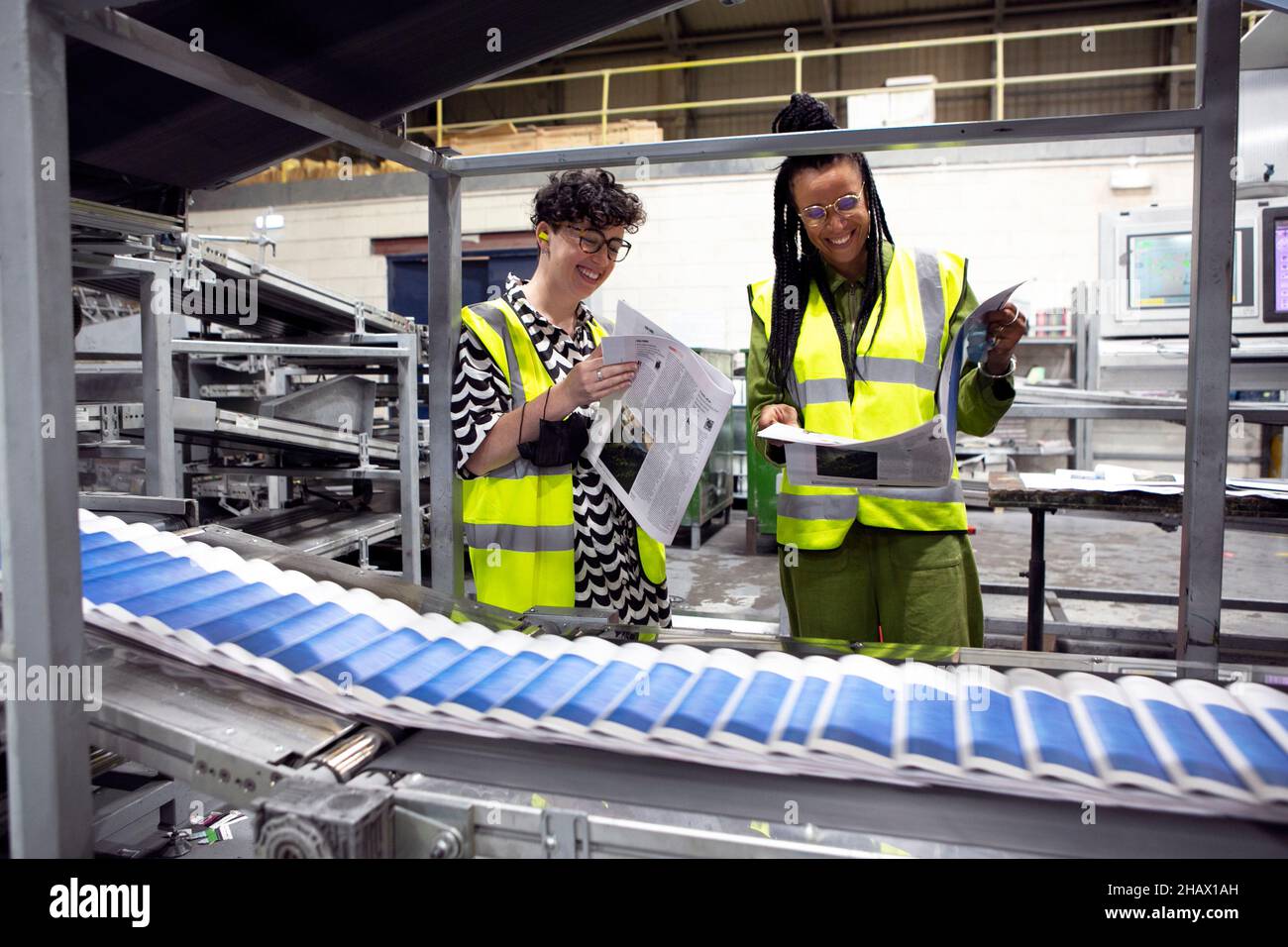 Ruth Lewy (Acting editor of Guardian saturday Mag) (left) & Mylene Sylvestre (Guardian publishing director) oversee the new Guardian Saturday Magazine Stock Photo