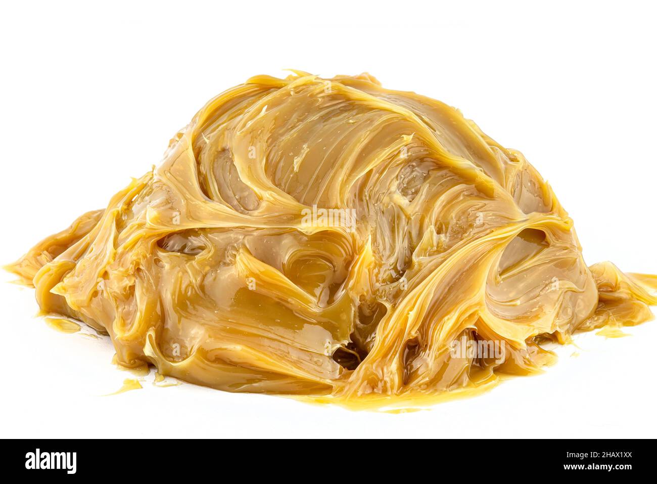 Macro photo of pile of machine grease, isolated on white background