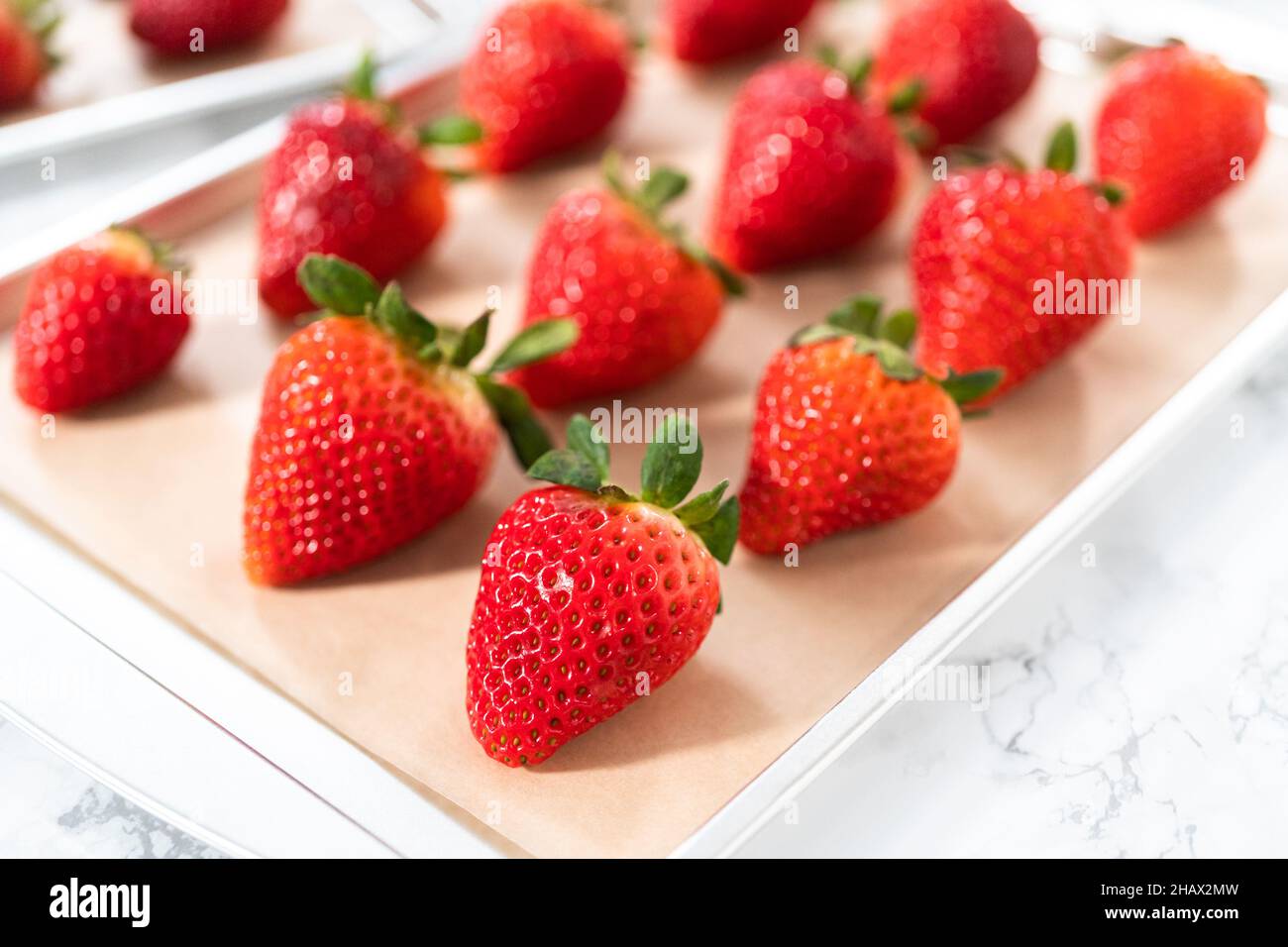 Ingredients to prepare chocolate dipped strawberries Stock Photo Alamy